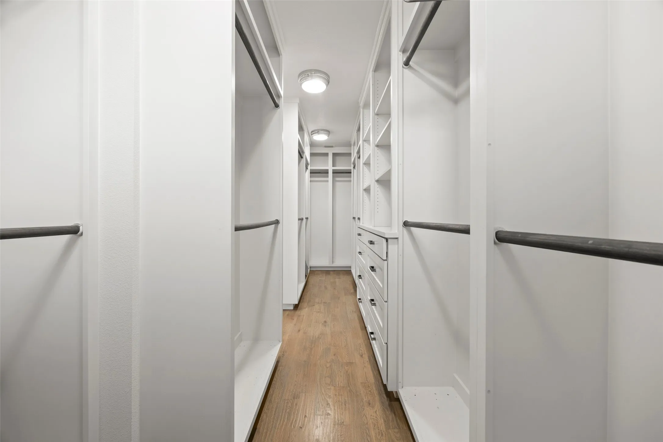 The primary closet has so many built-ins!