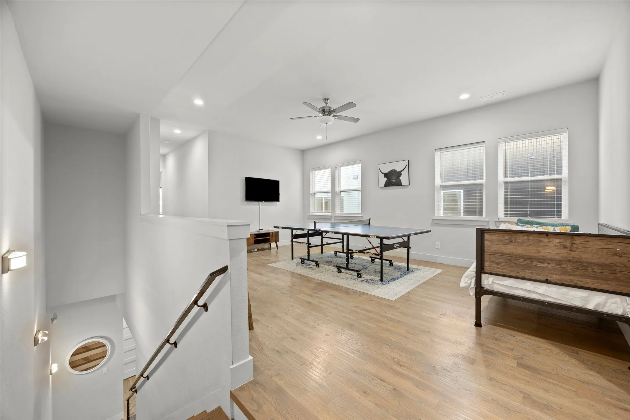 At the top of the stairs, you will find a large family room
