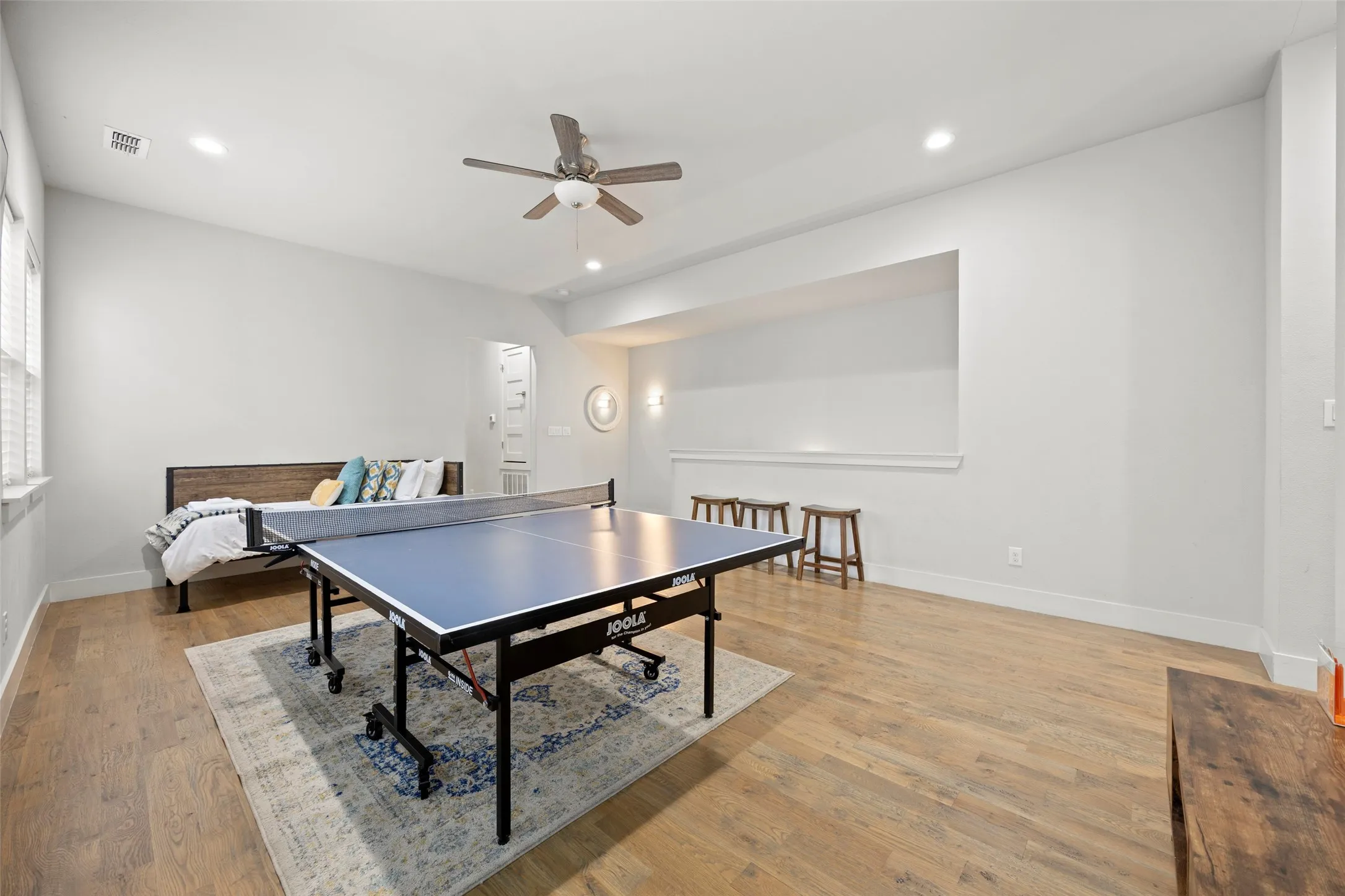 At the top of the stairs, you will find a large family room