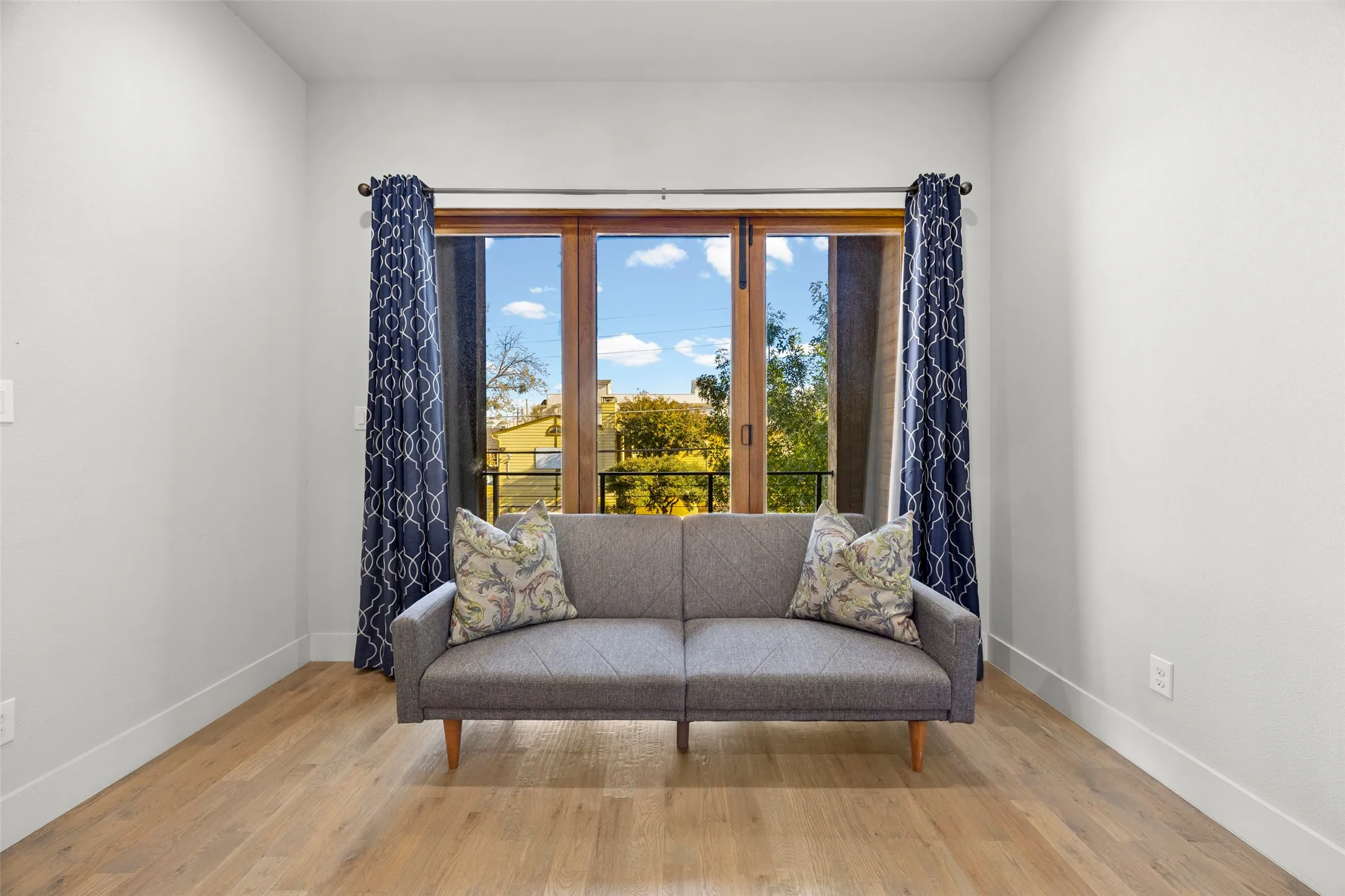Sitting room in the primary suite has a door to the patio