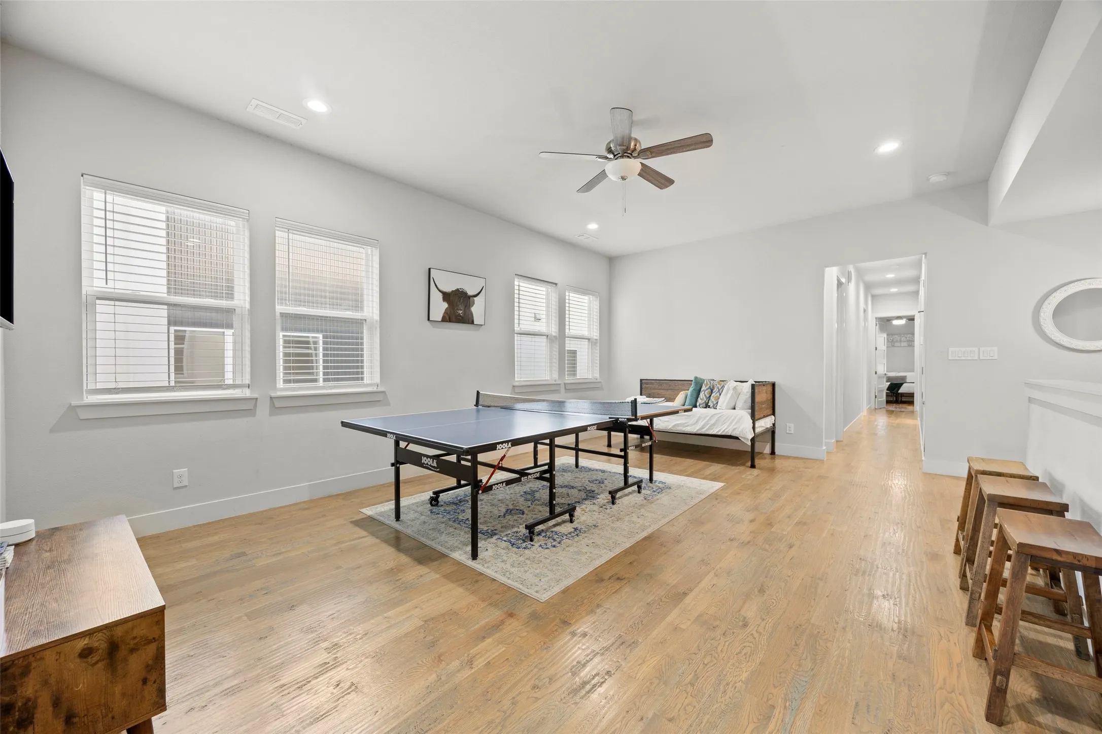 At the top of the stairs, you will find a large family room