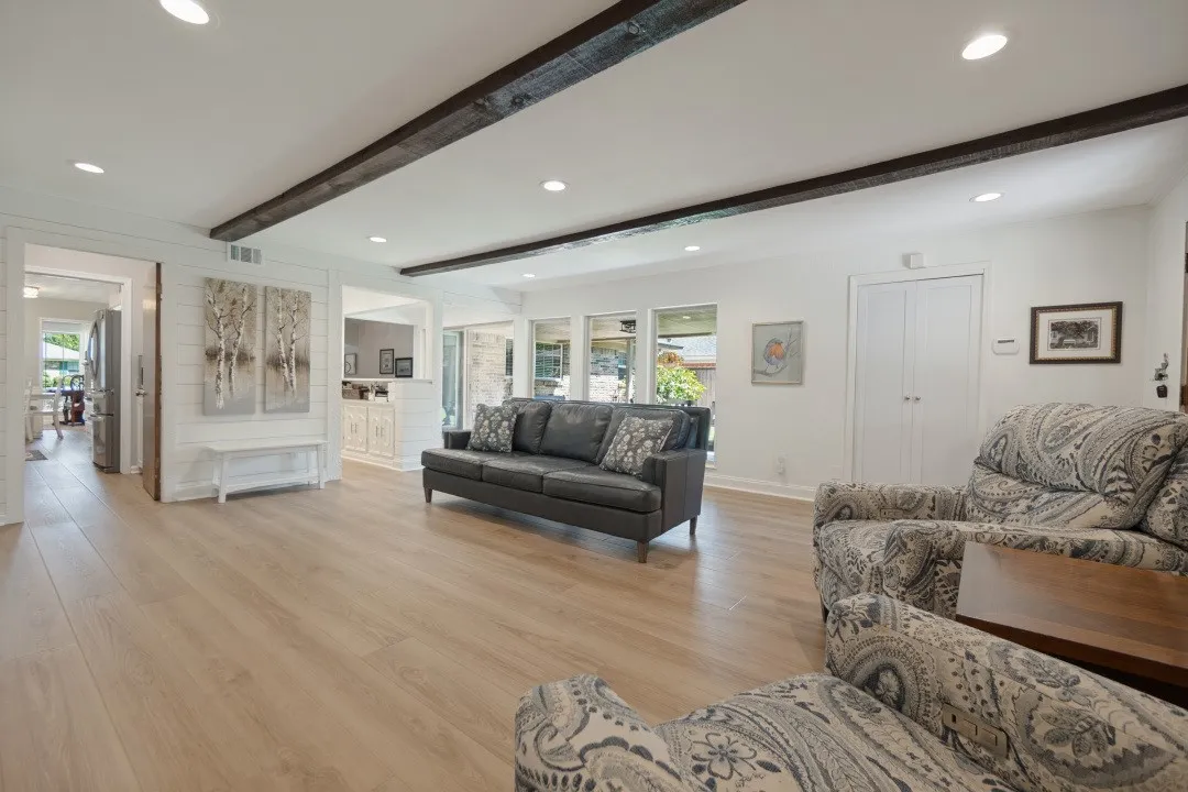 Family Room opens to the office or dry bar, utility room with pantry cabinets, thru the slider door to the covered patio & lawn, and out the back door to the garage & other parking​​‌​​​​‌​​‌‌​‌‌​​​‌‌​‌​‌​‌​​​‌​​ areas.