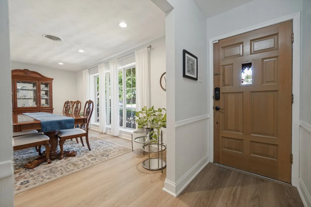 Entry to this beautifully remodeled home, but left the charm.