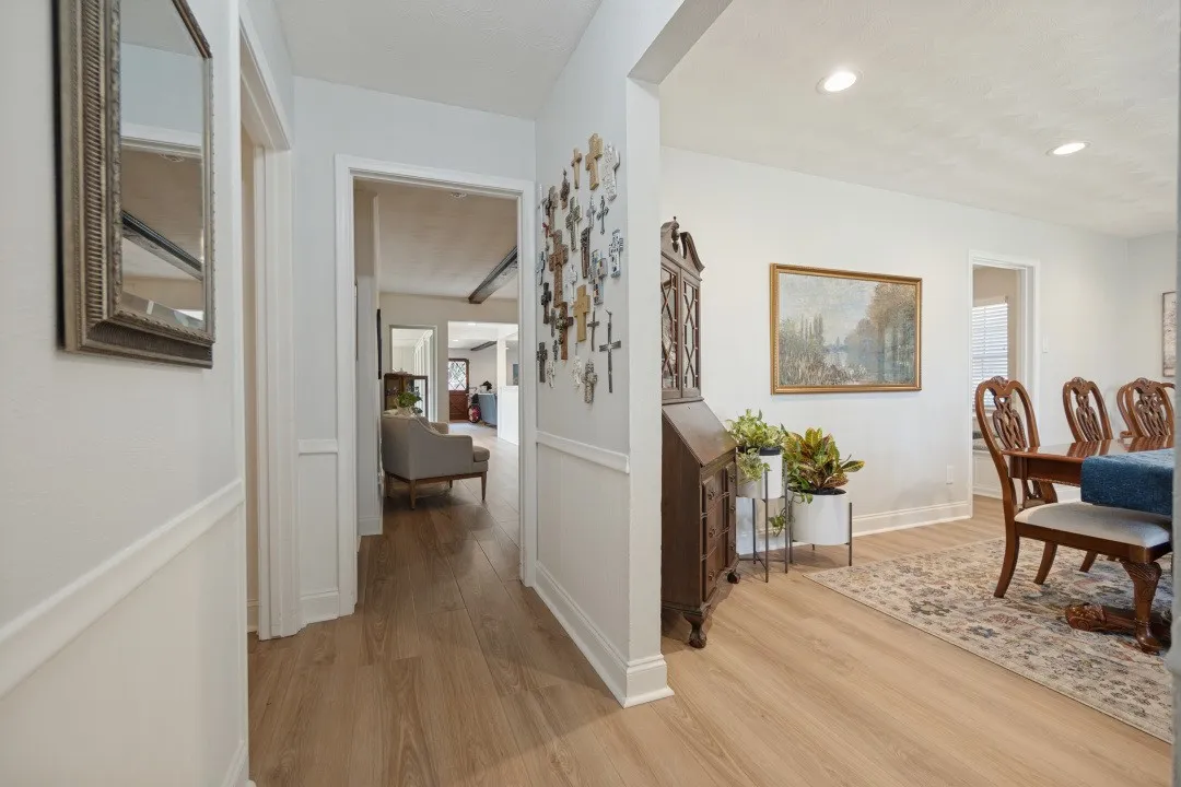 Luxury Vinyl Plank floors from the front door to back door & throughout the home, except bathrooms.