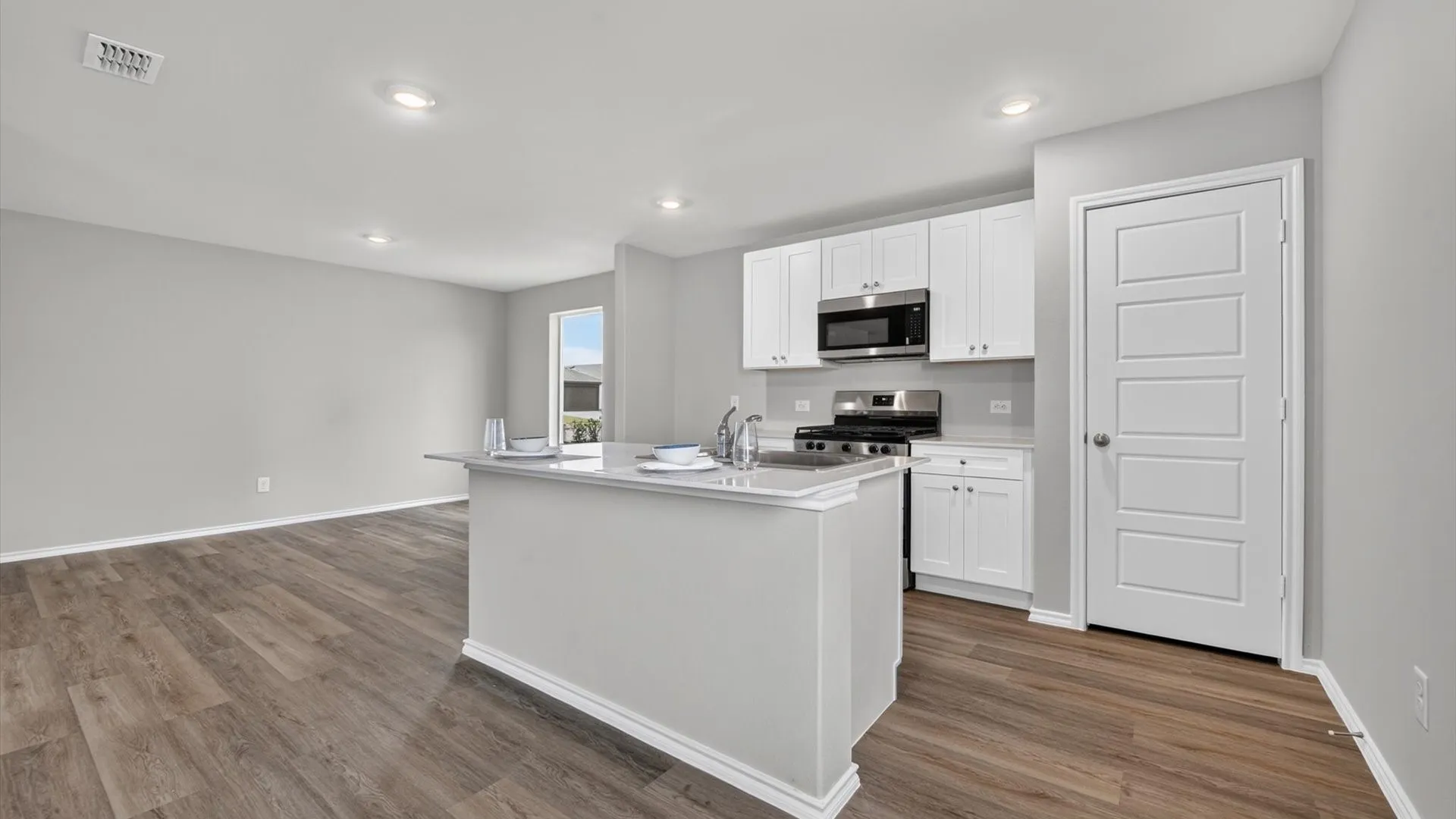 Kitchen - All Home and community information, including pricing, included features, terms, availability and amenities, are subject to change at any time without notice or obligation. All Drawings, pictures, photographs, video, square footages, floor plans, elevations, features, colors and sizes are approximate for illustration purposes only and will vary from the homes as built.