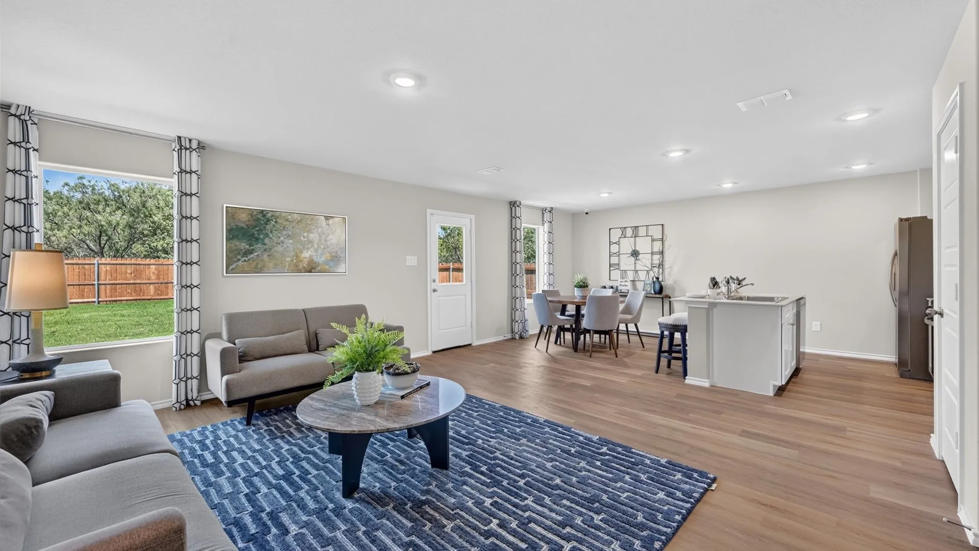 Open Living Area - All Home and community information, including pricing, included features, terms, availability and amenities, are subject to change at any time without notice or obligation. All Drawings, pictures, photographs, video, square footages, floor plans, elevations, features, colors and sizes are approximate for illustration purposes only and will vary from the homes as built.