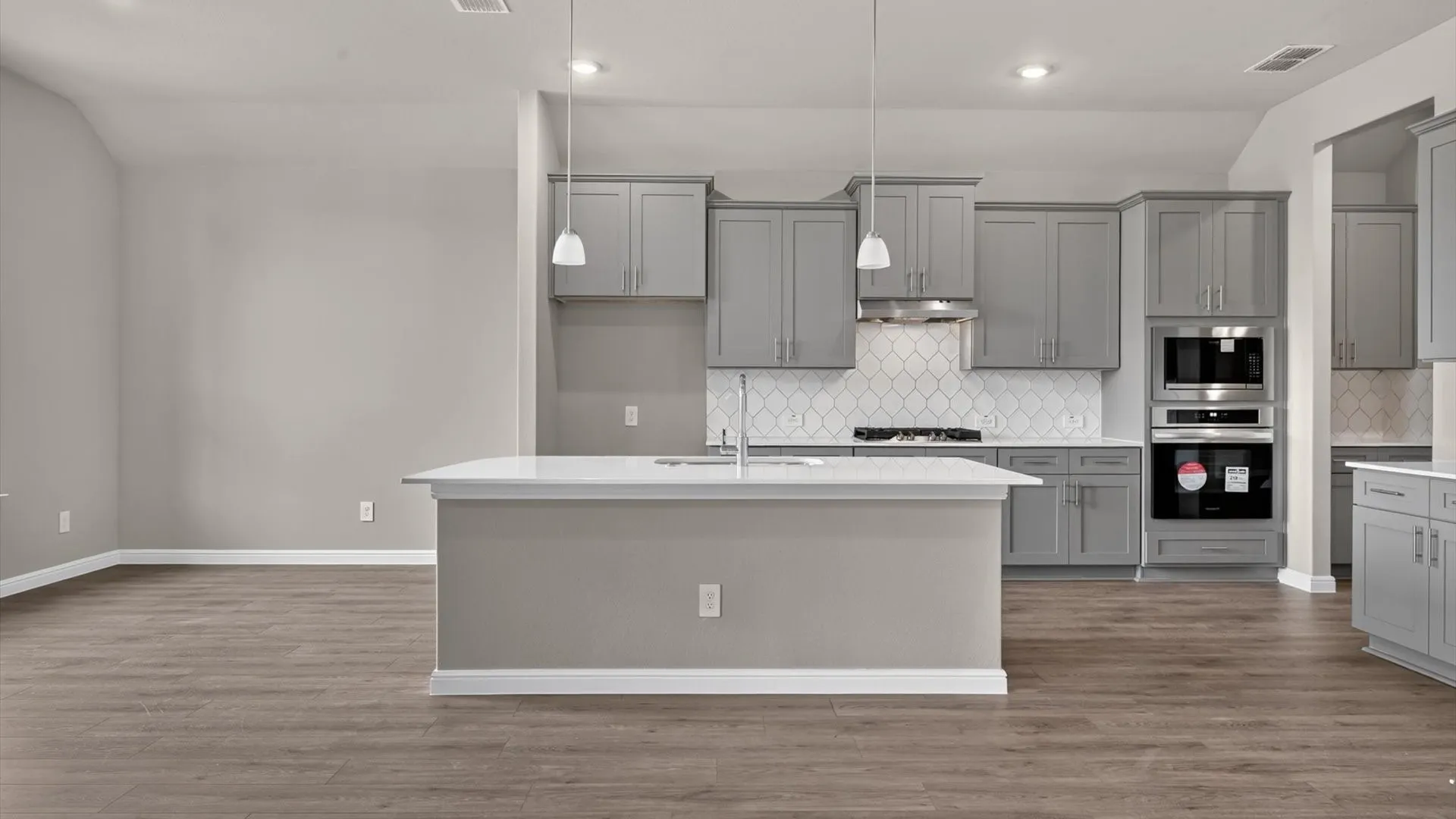 Kitchen - All Home and community information, including pricing, included features, terms, availability and amenities, are subject to change at any time without notice or obligation. All Drawings, pictures, photographs, video, square footages, floor plans, elevations, features, colors and sizes are approximate for illustration purposes only and will vary from the homes as built.
