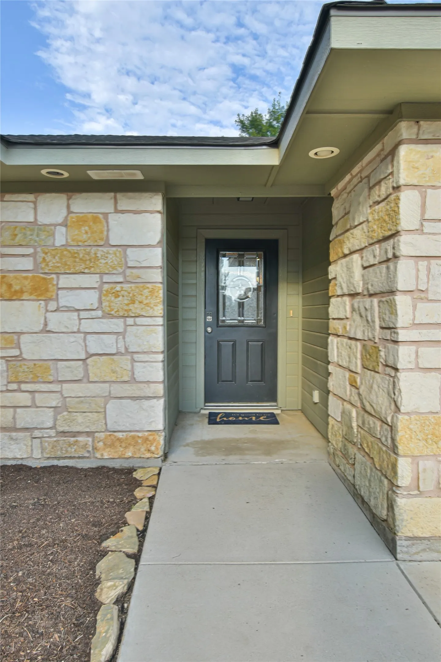 Stone veneer facade accents