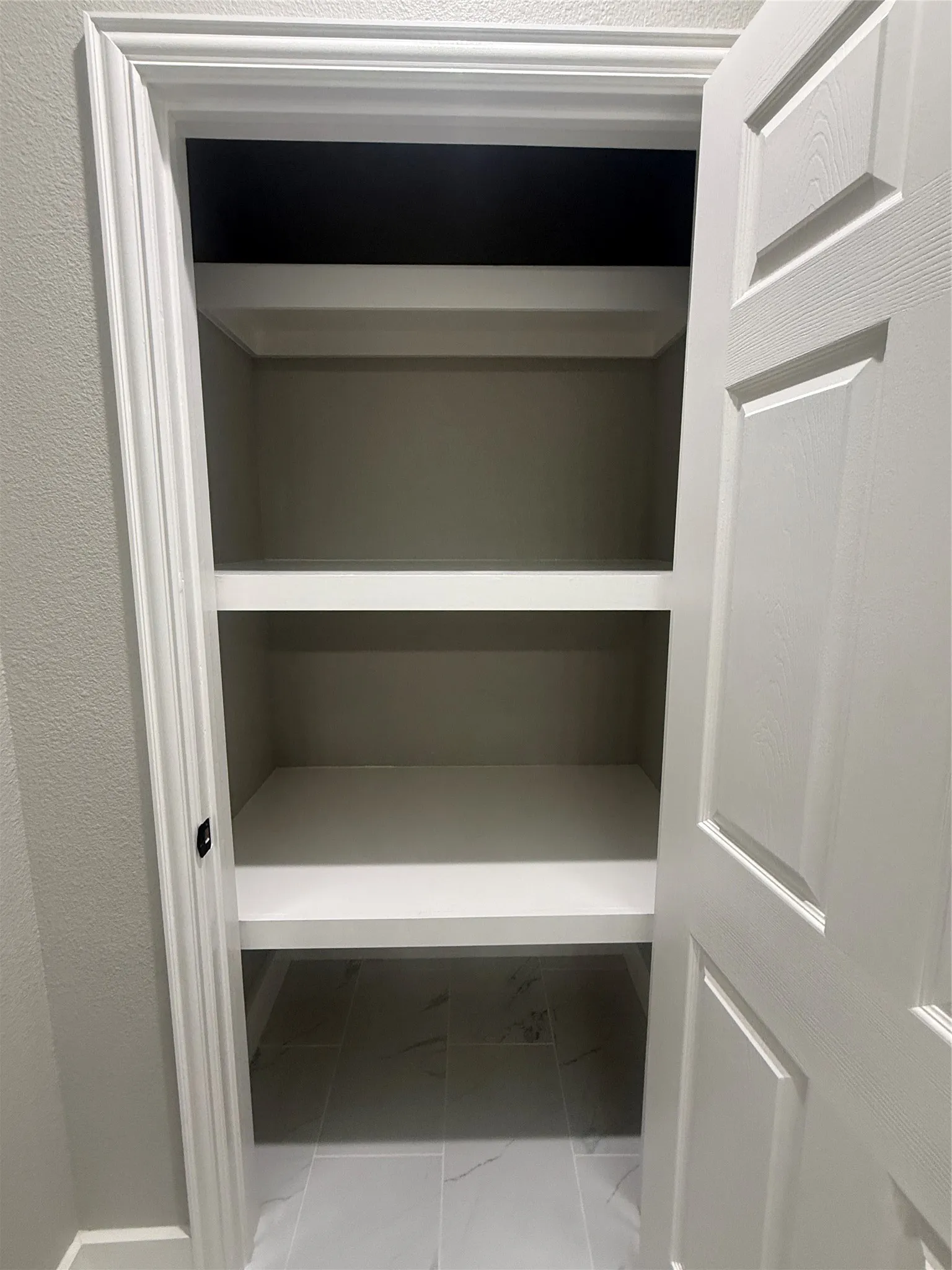 Custom built-in shelving, for additional storage, white trim