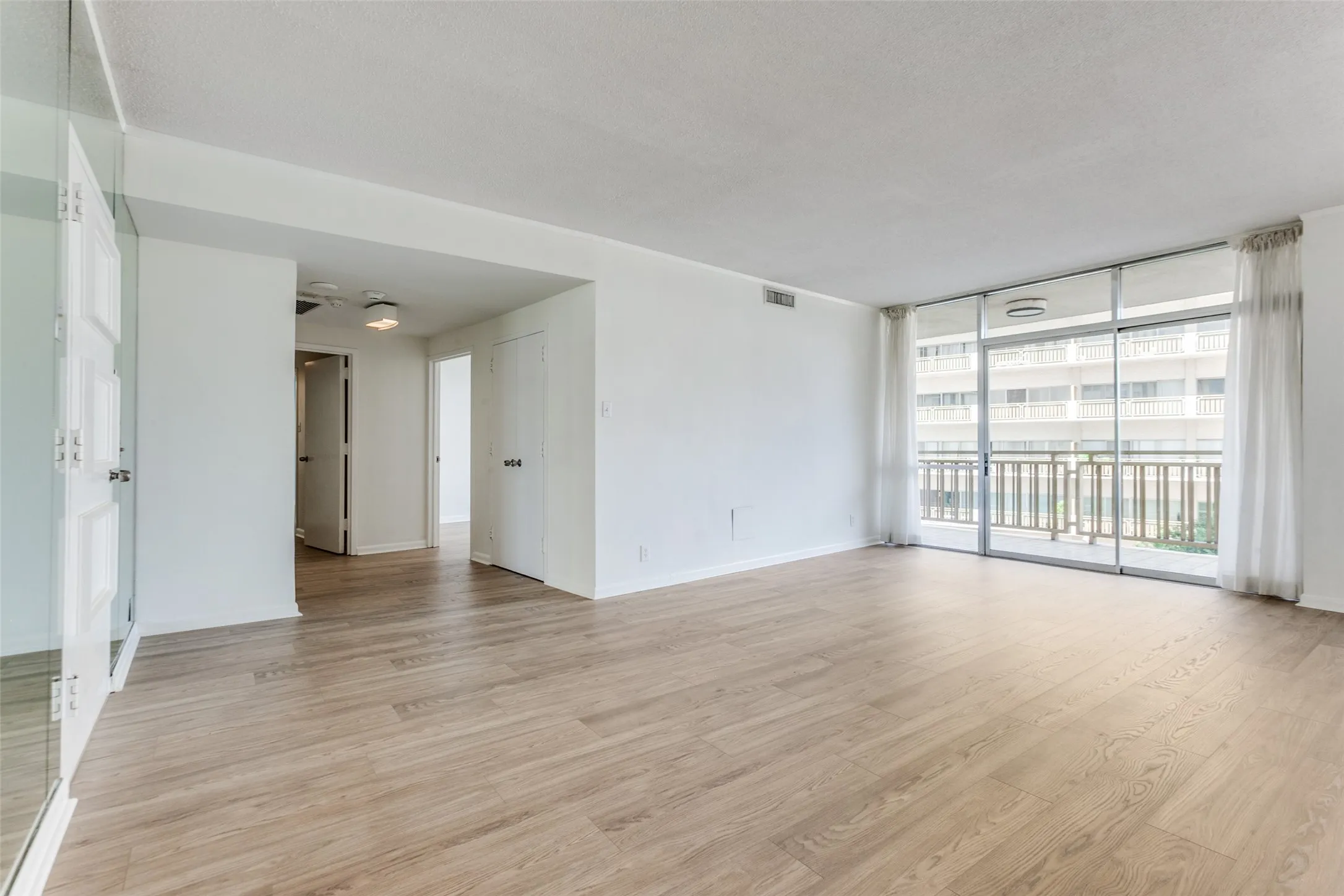 Living area showing beroom hallway