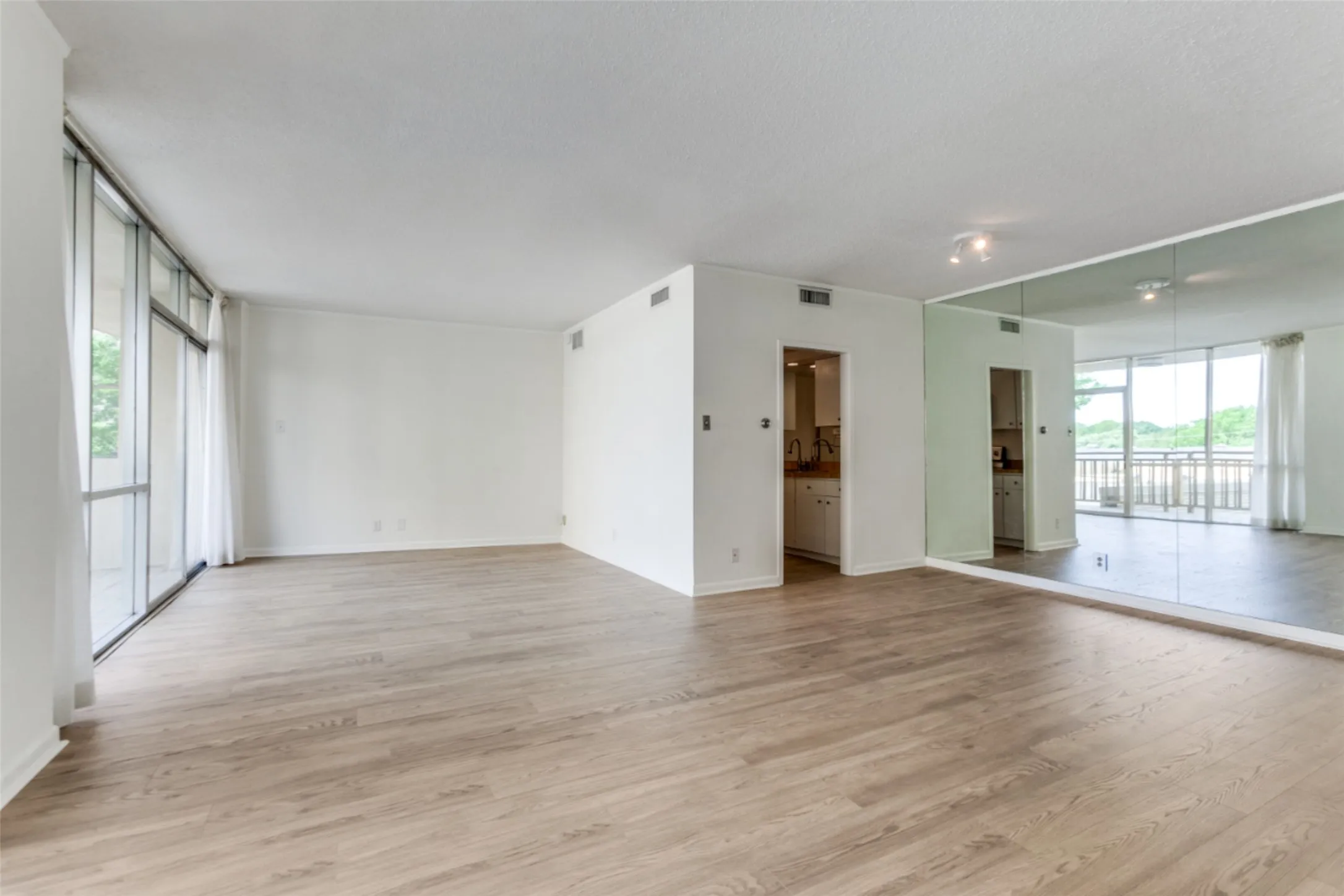 Living-dining area showing entrance to kitchen