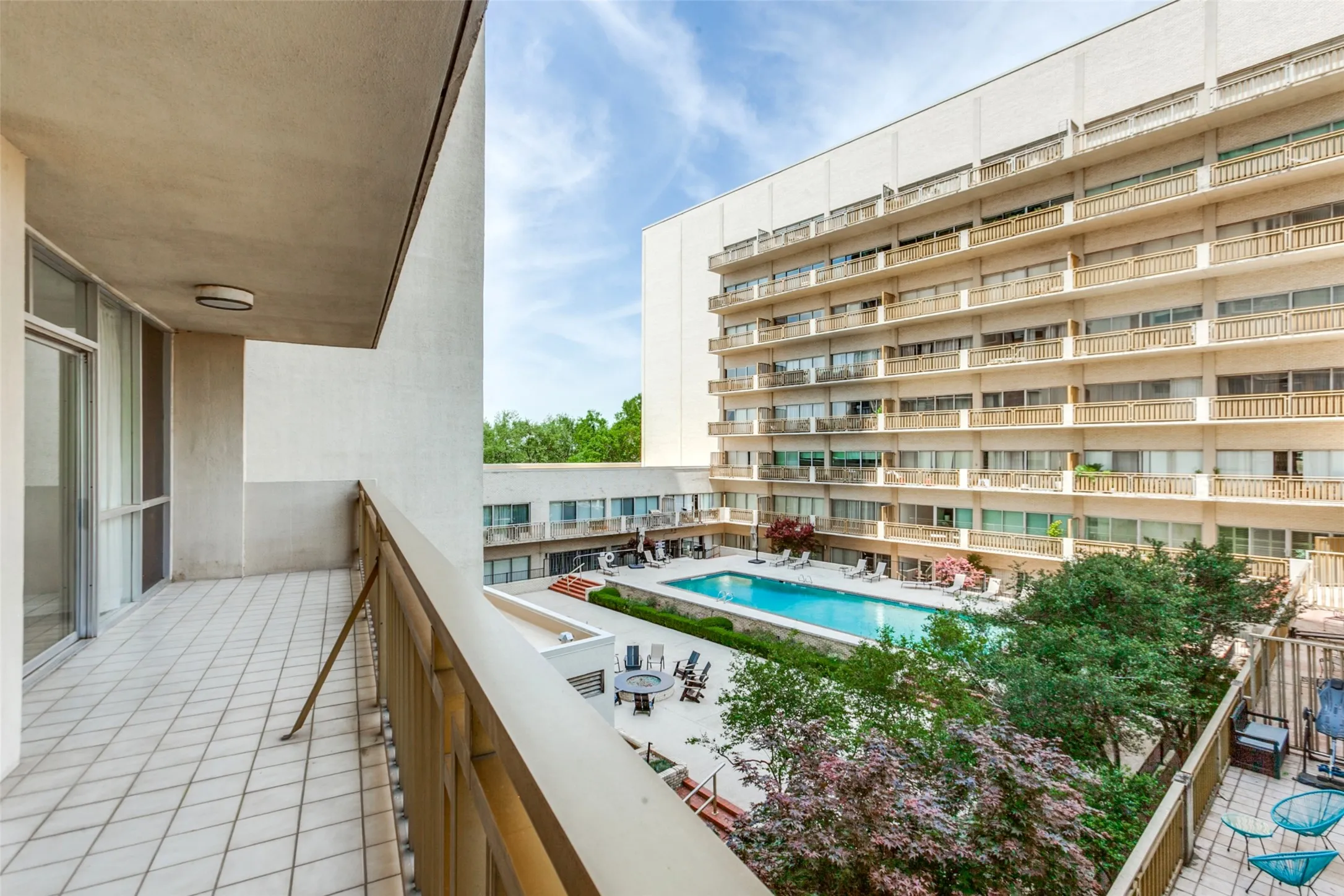 32' balcony overlooking the pool courtyard