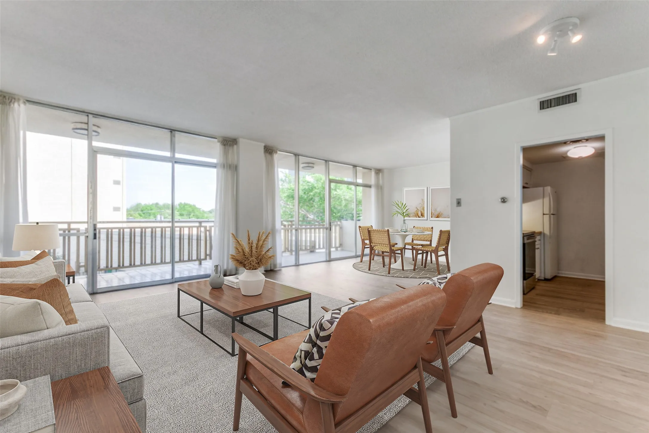 Living-dining area (virtually staged)