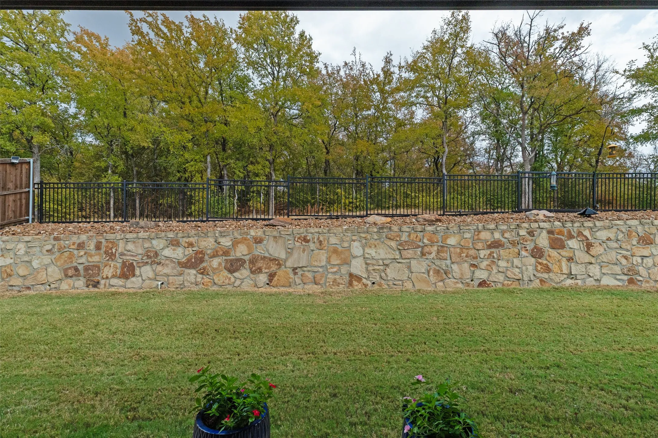 Privacy galore, your peaceful view from the backyard patio. Home backs onto Corps of Engineer property with an abundance of walking trails and is just 200 yards from Lake Lewisville.
