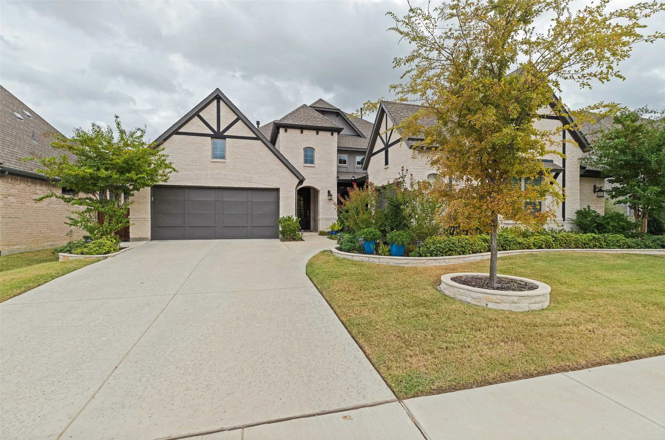 This lovely home has 3 garage spaces and a lovely entryway