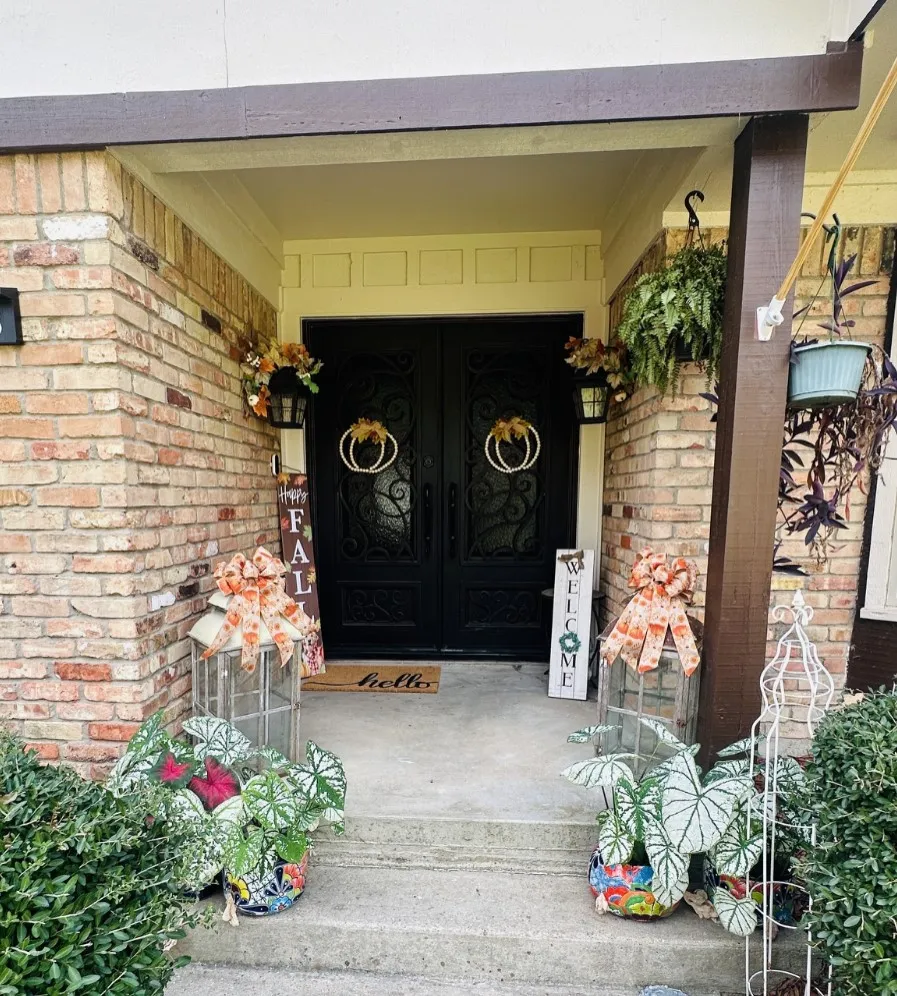 Brick exterior with a covered entry