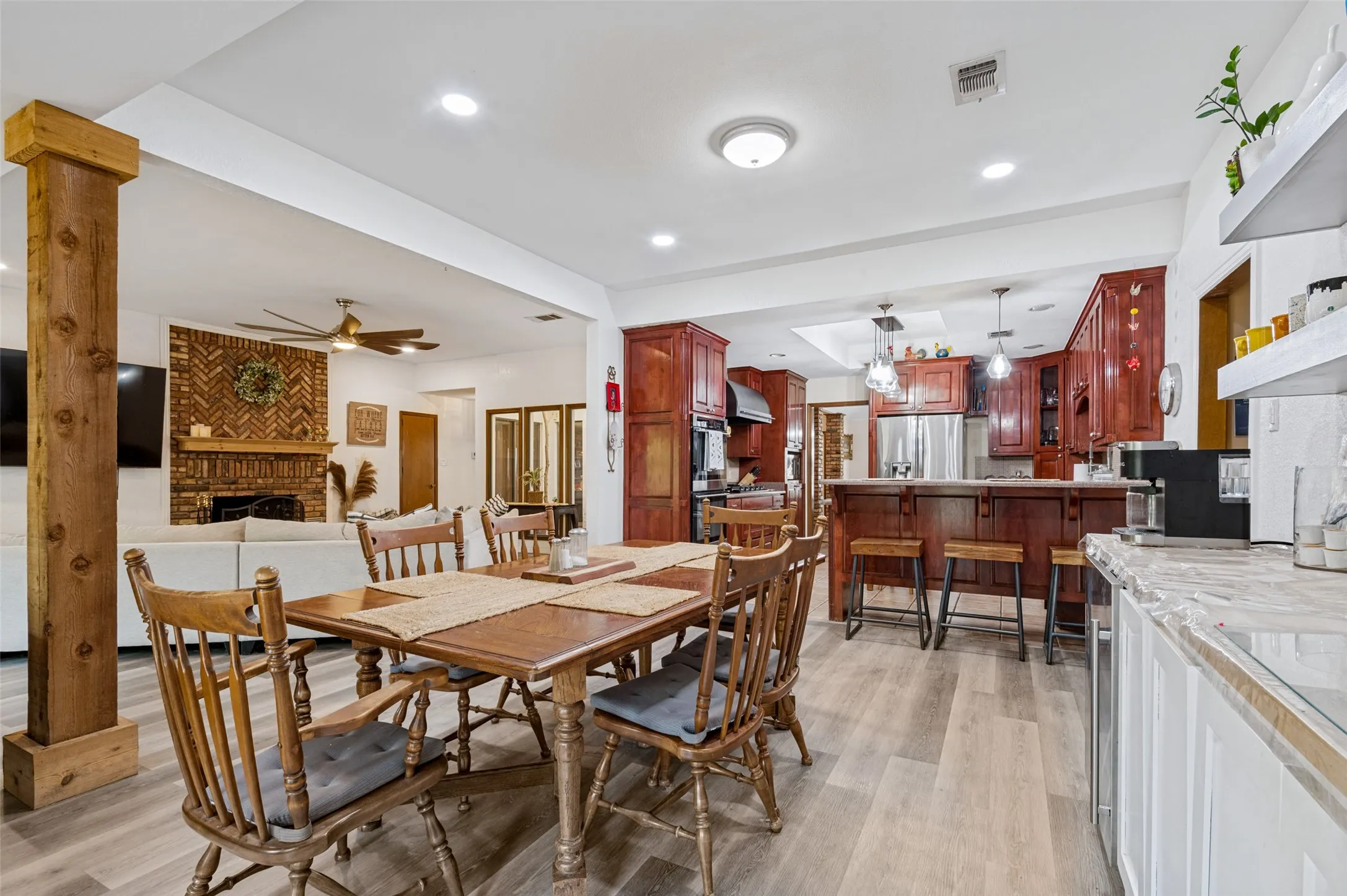 Open-concept breakfast area with views into the kitchen and great room, highlighting the home's spacious, connected living areas.