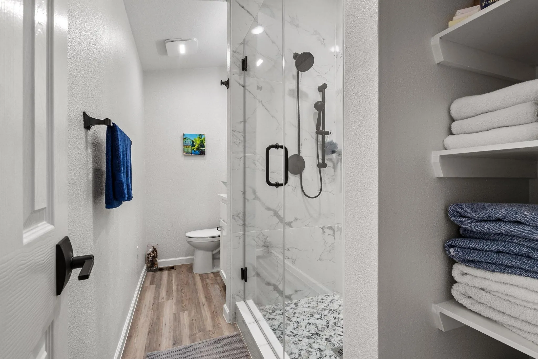 Just Steps from the Main Living Area, this Full Bath is Both Functional and Beautiful