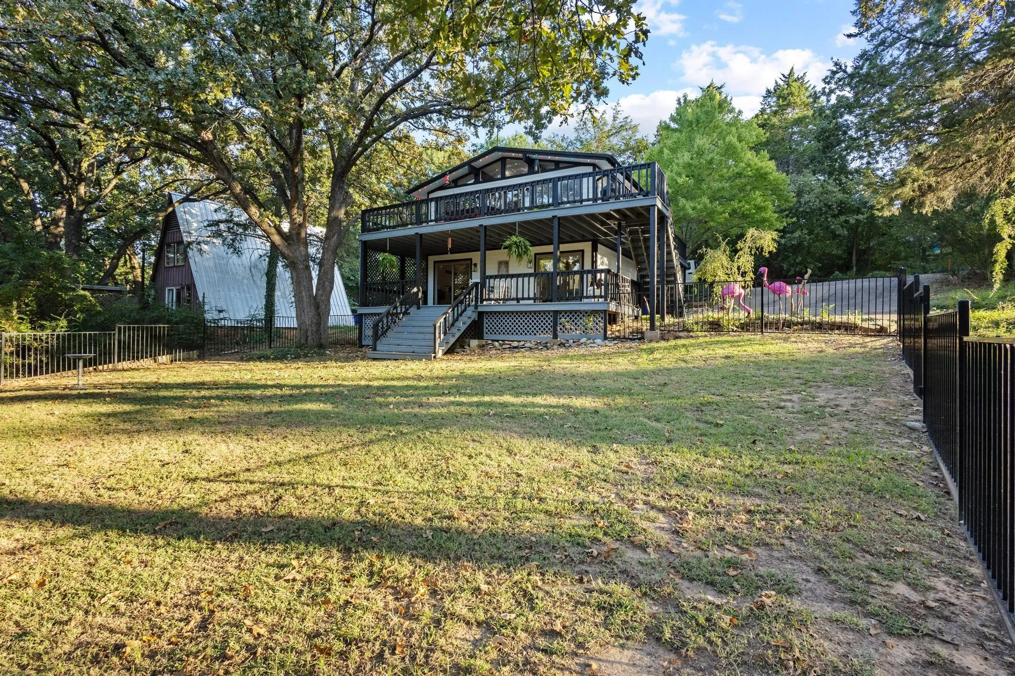 The Wrought Iron Fenced Backyard Area Provides Peace of Mind
