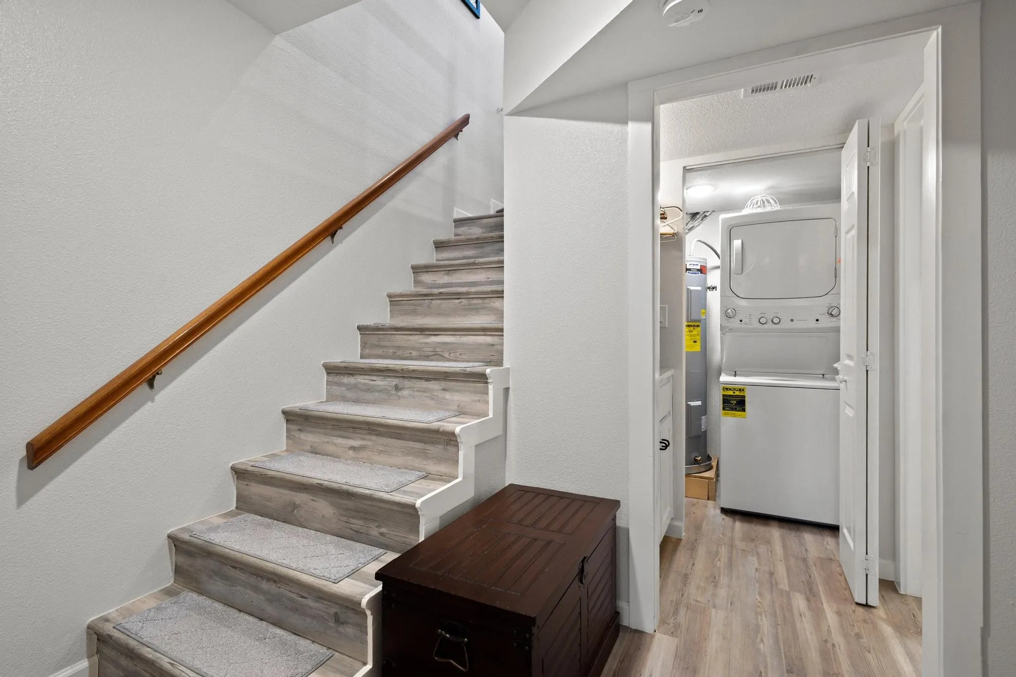 Head to the Lower Level which Includes Laundry and Storage Options