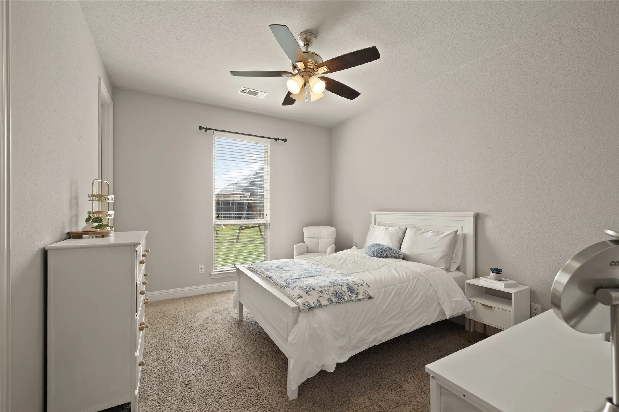 1 of 3 secondary bedrooms. This one has the ensuite bathroom