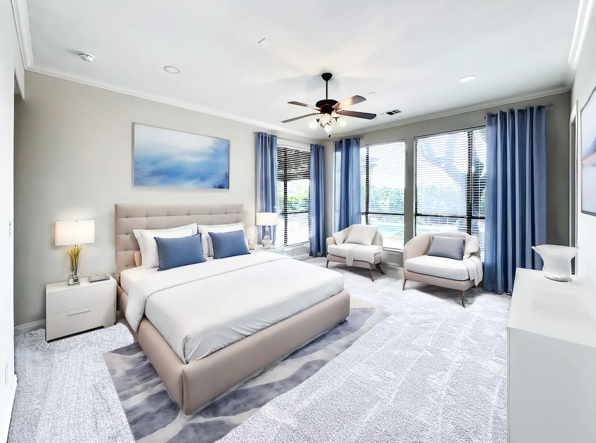 Recessed lighting, crown molding, ceiling fan, expansive windows, and plush carpeting