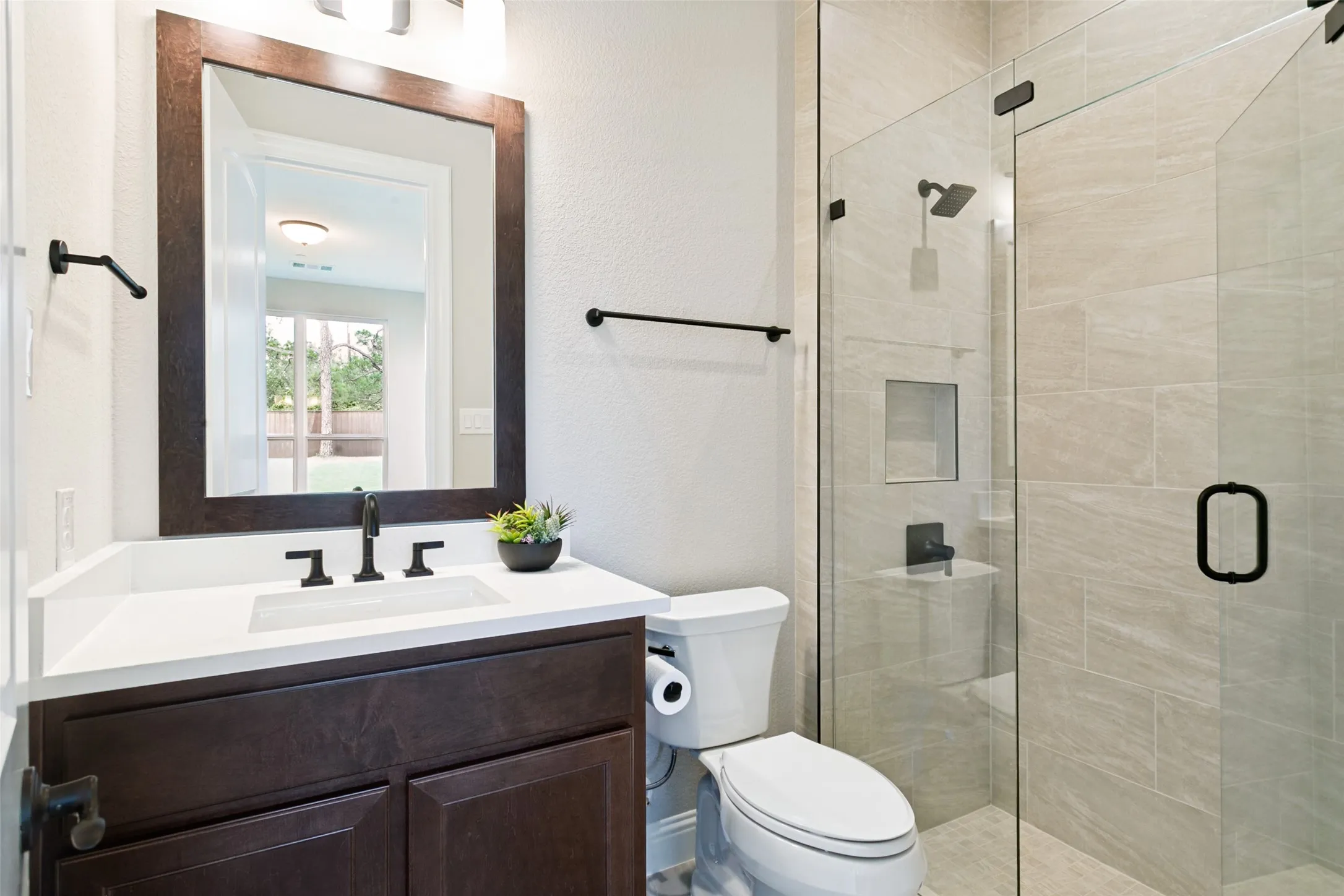 Ensuite Full Bath with Walk-In Shower.