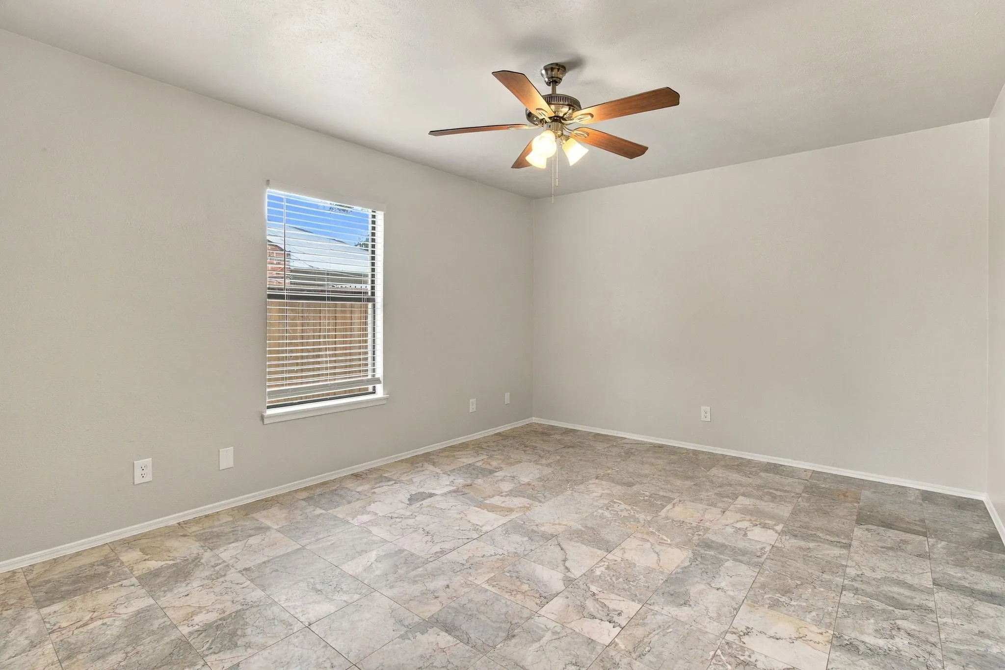 Neutral wall paint with durable tile flooring