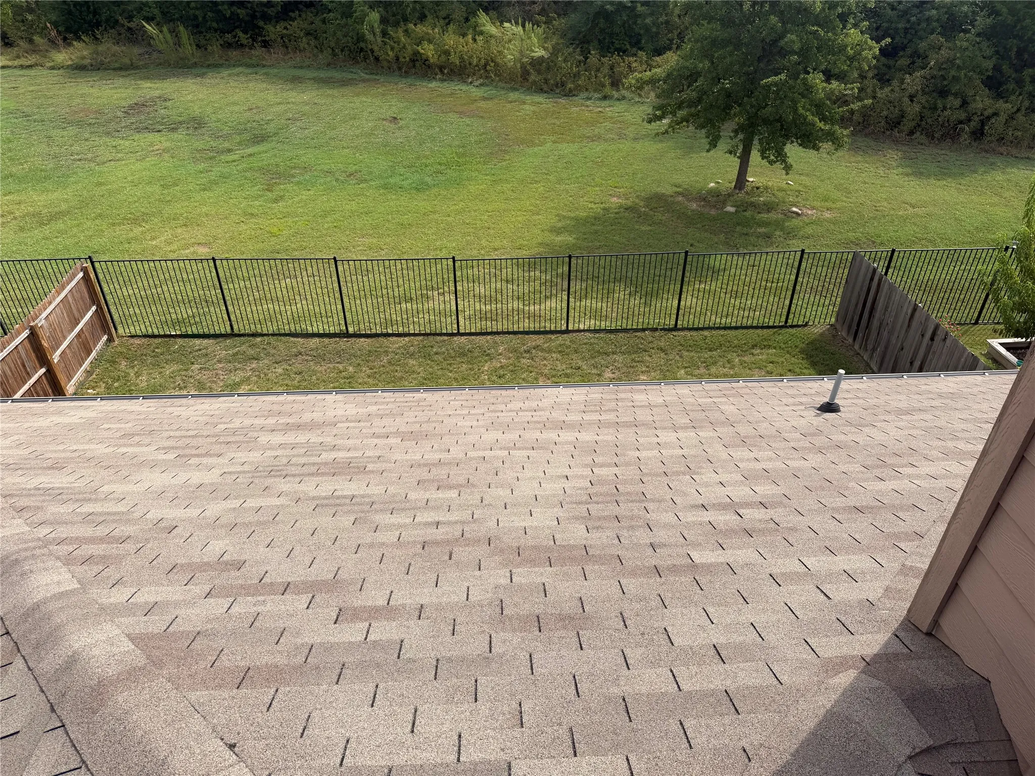 Rooftop view of backyard overlooking your greenbelt privacy.