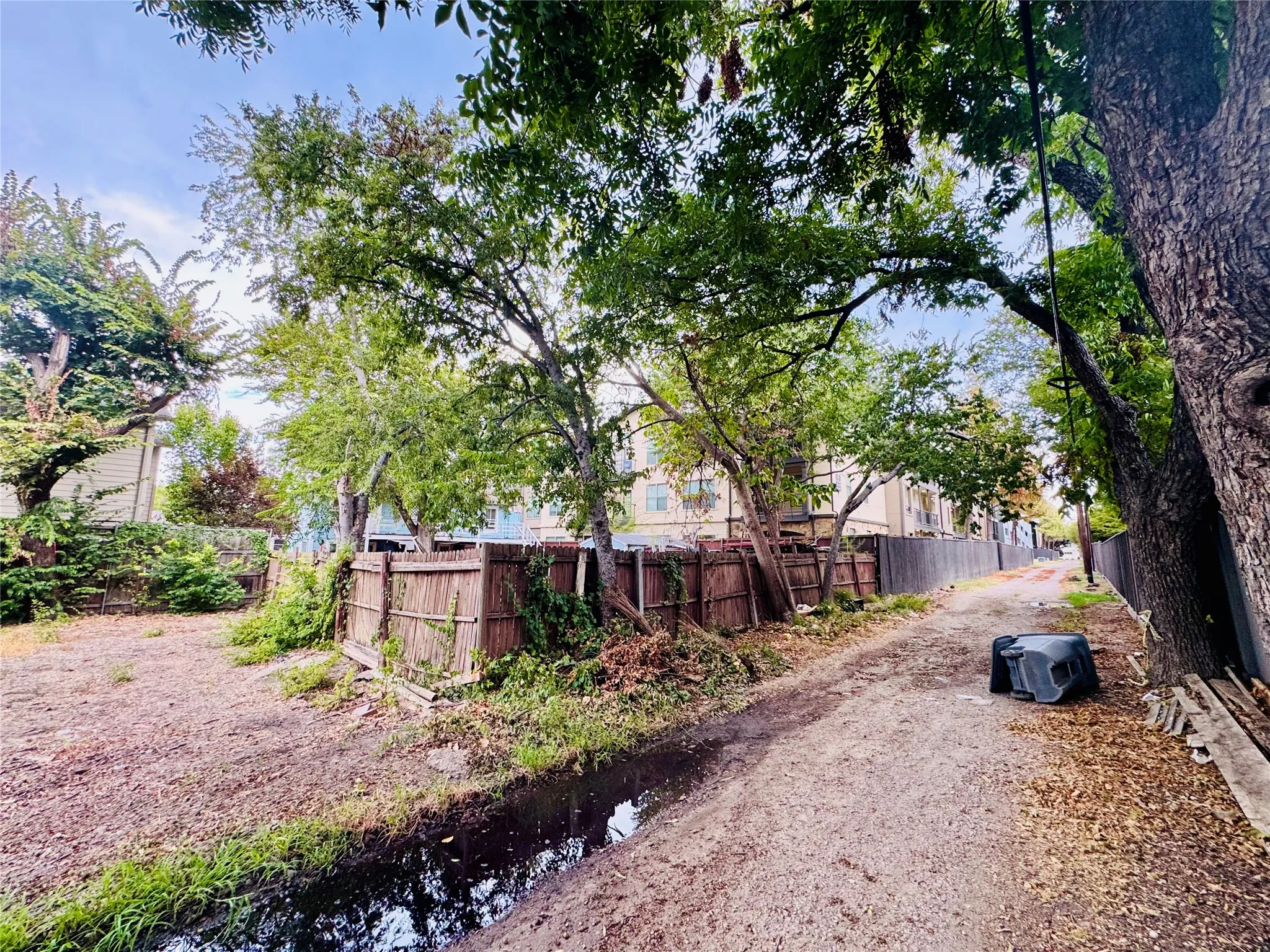 Dedicated rear alley access along south property boundary providing direct ingress and egress for redevelopment.