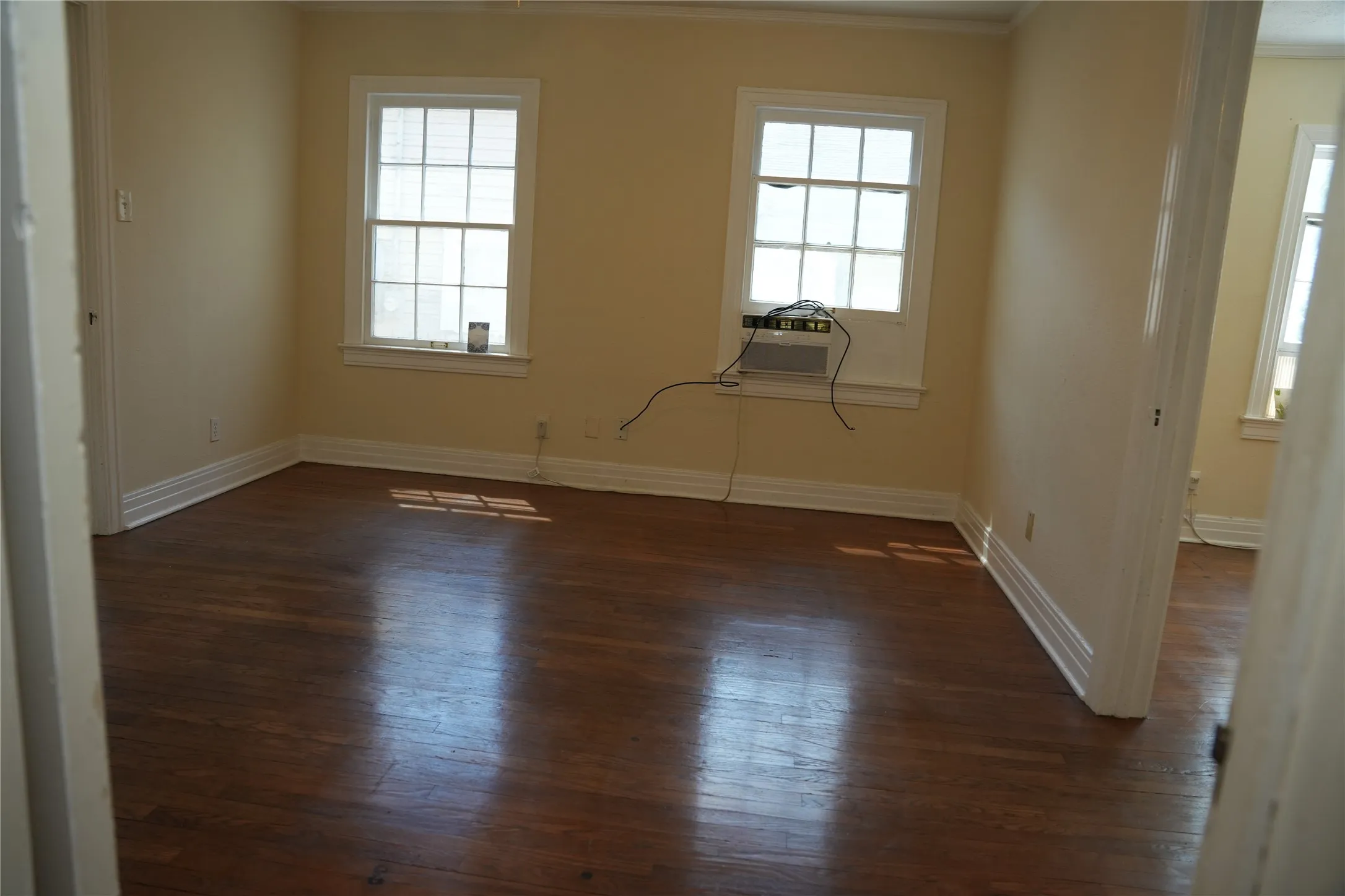 Dining / flex living area with abundant natural light.