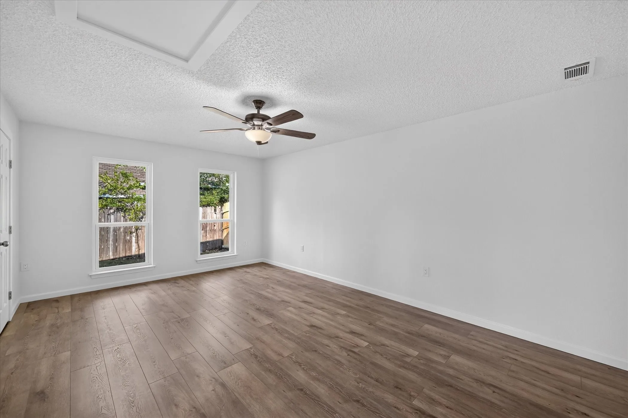 Additional view of bonus room with plenty of natural light!