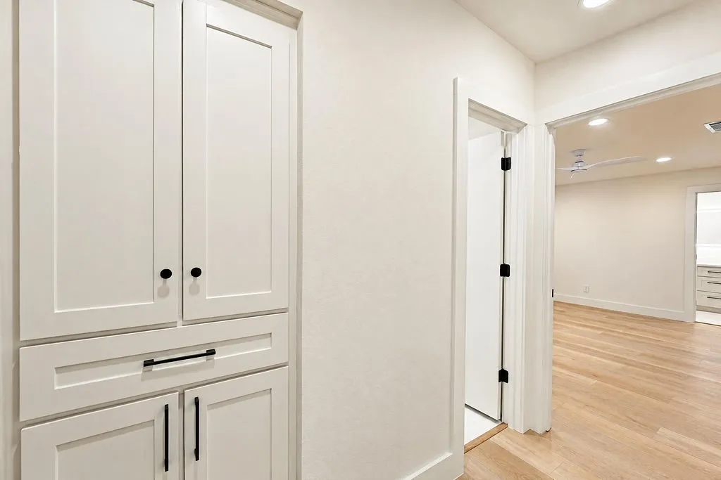 Built-in shaker style cabinetry with matte black hardware