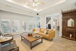 Tray ceiling with recessed lighting and a ceiling fan