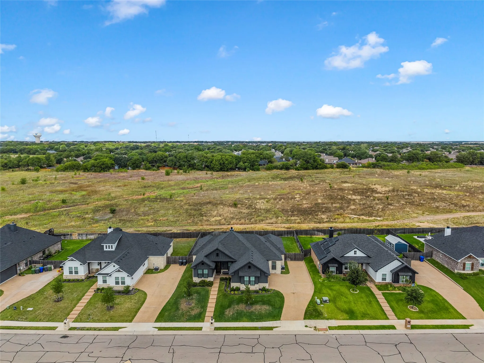 Aerial perspective showcasing multiple properties