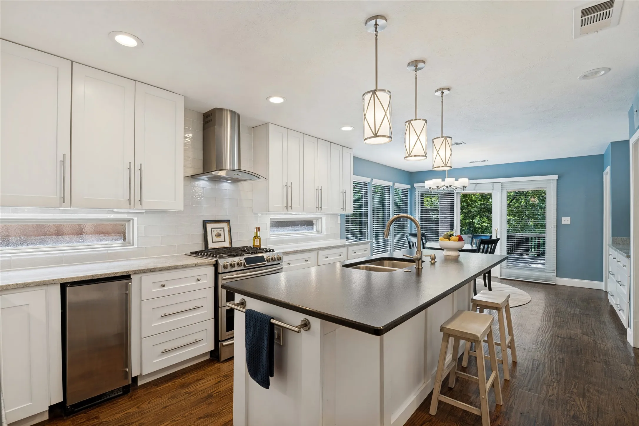 Windowed backsplash is another clever way to bring in natural light!