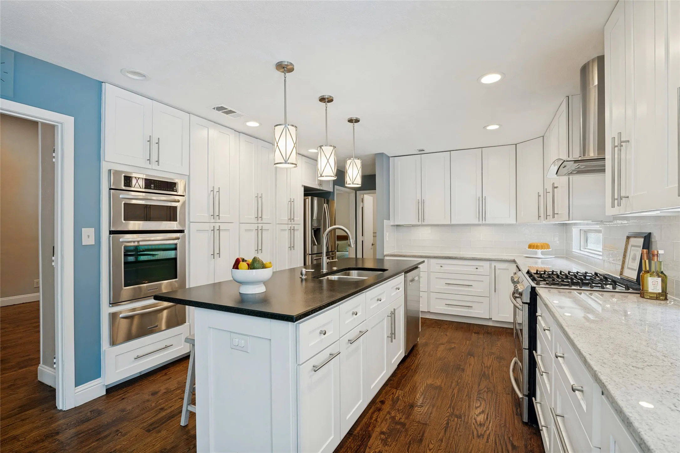 Range with gas cooktop, additional wall oven, microwave, warming drawer, beverage refrigerator, etc!