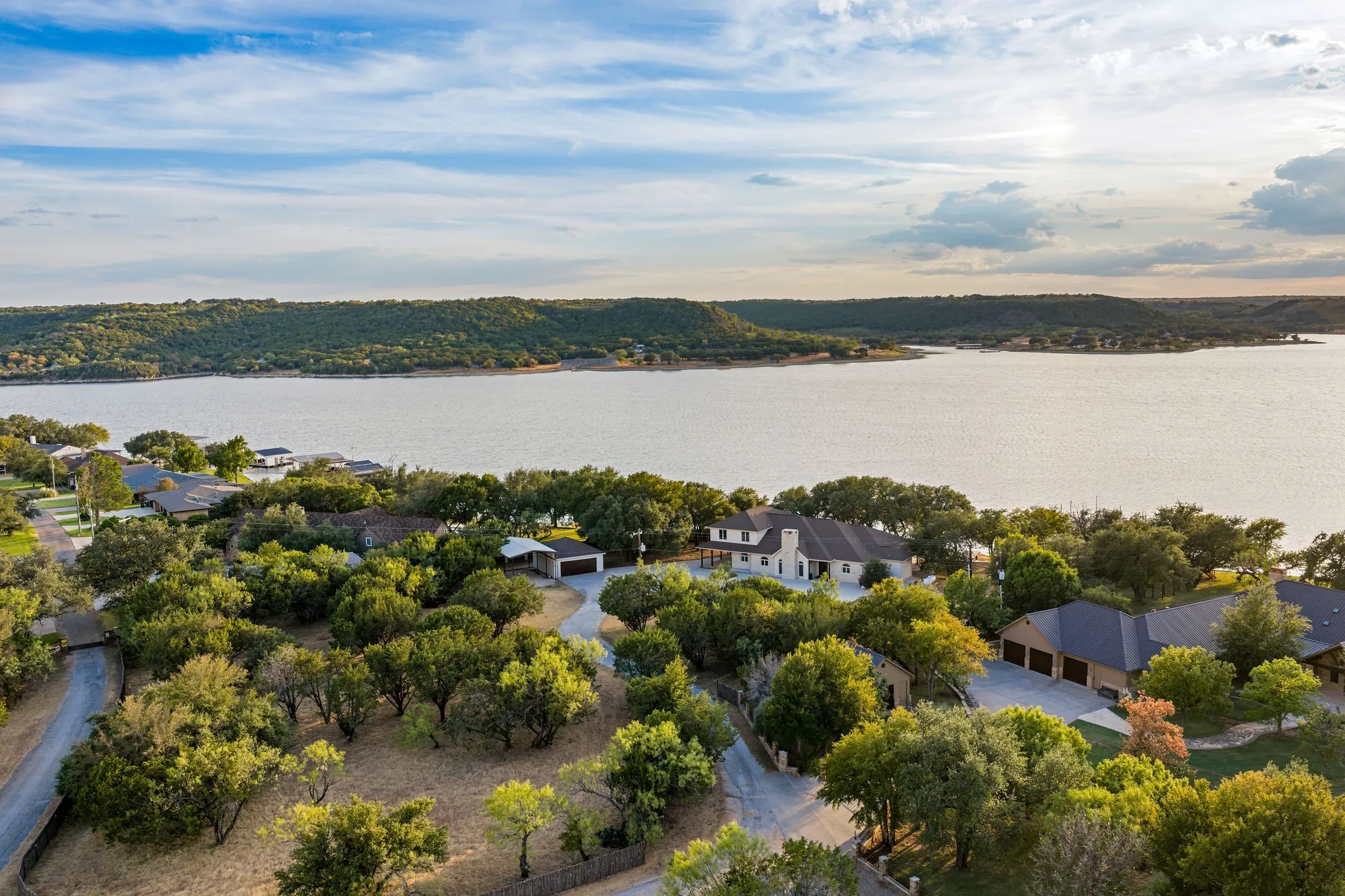 Situated on the quieter west side of PK, this property offers deep water and million dollar sunsets.
