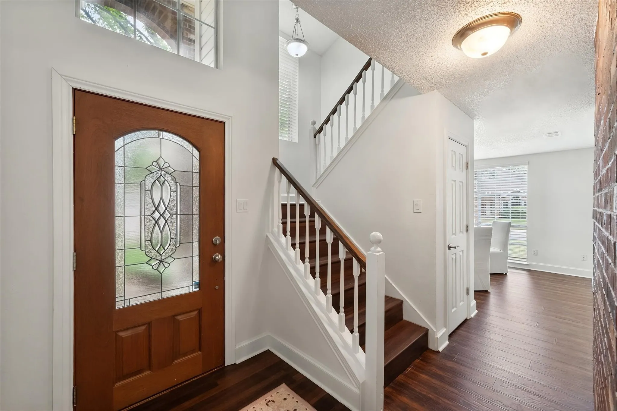 A glass door welcomes each visitor.