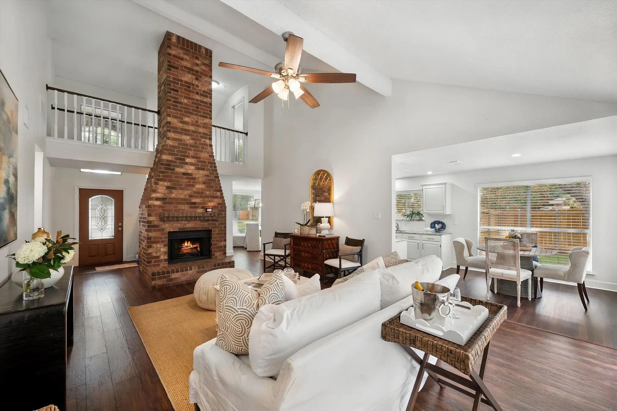 This open floor plan has a soaring ceiling.