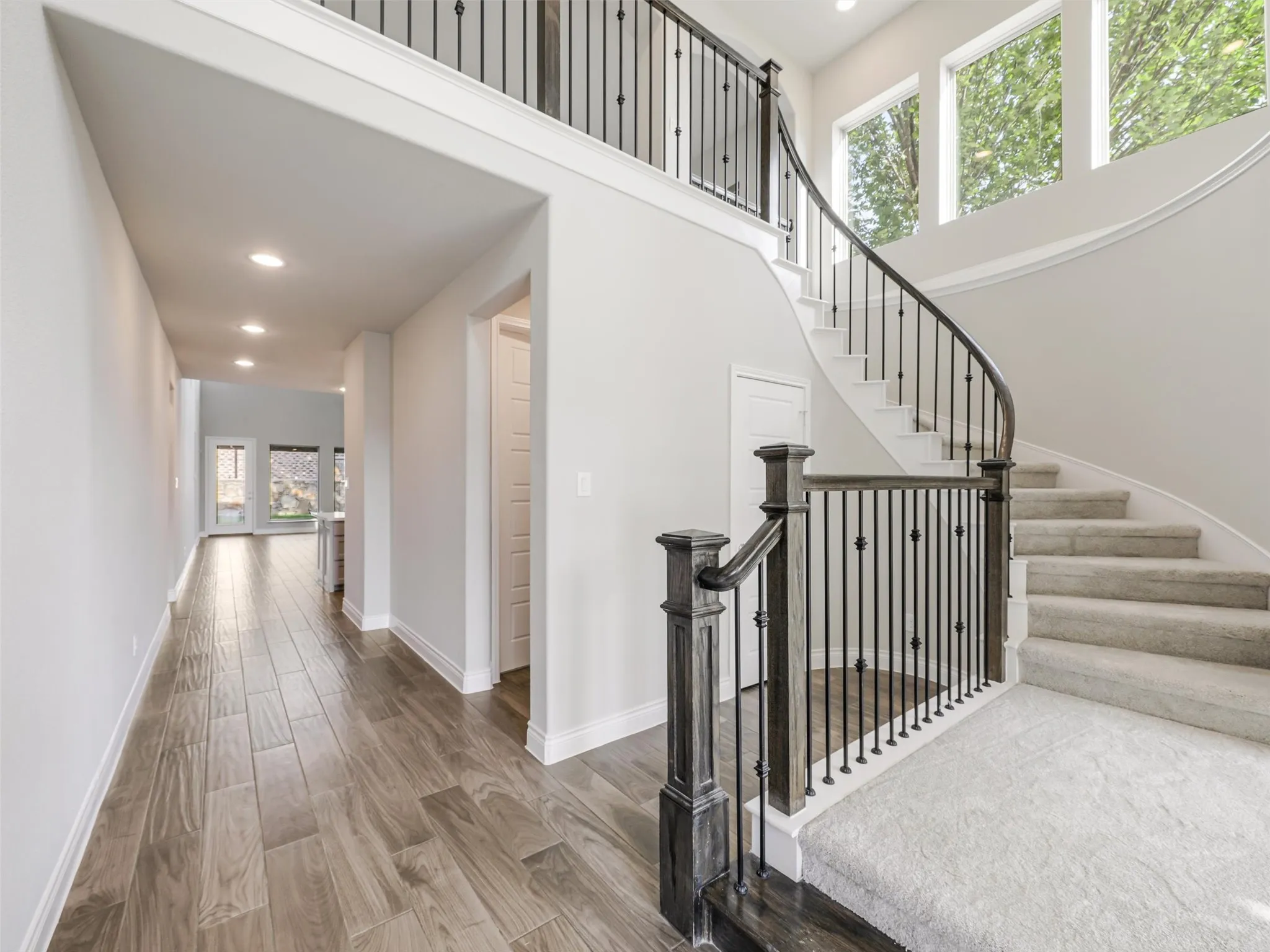 Upstairs, the home continues to offer generous living and storage space