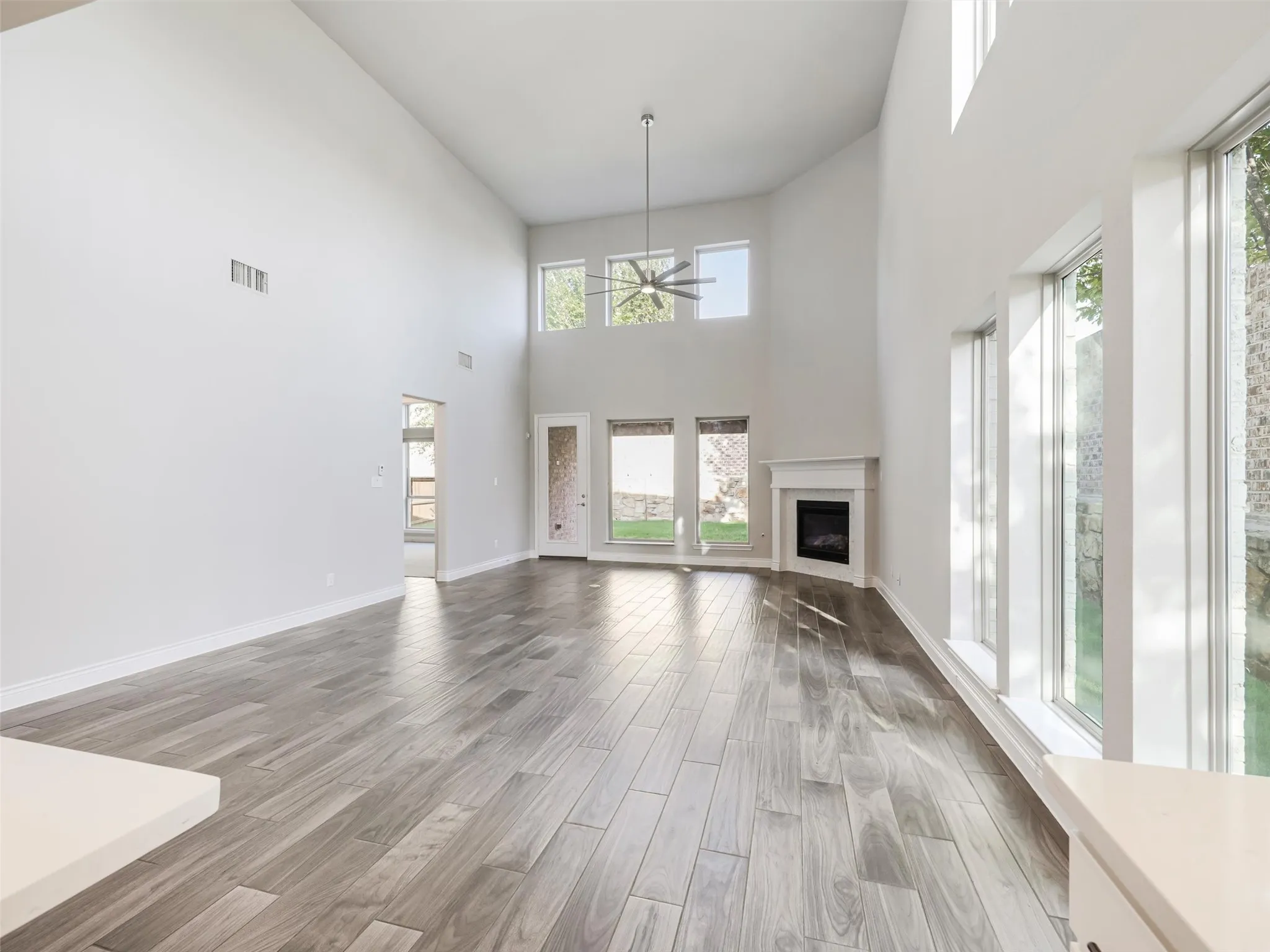 . The open-concept design allows the kitchen, dining, and living spaces to flow naturally together while still maintaining their individual character.