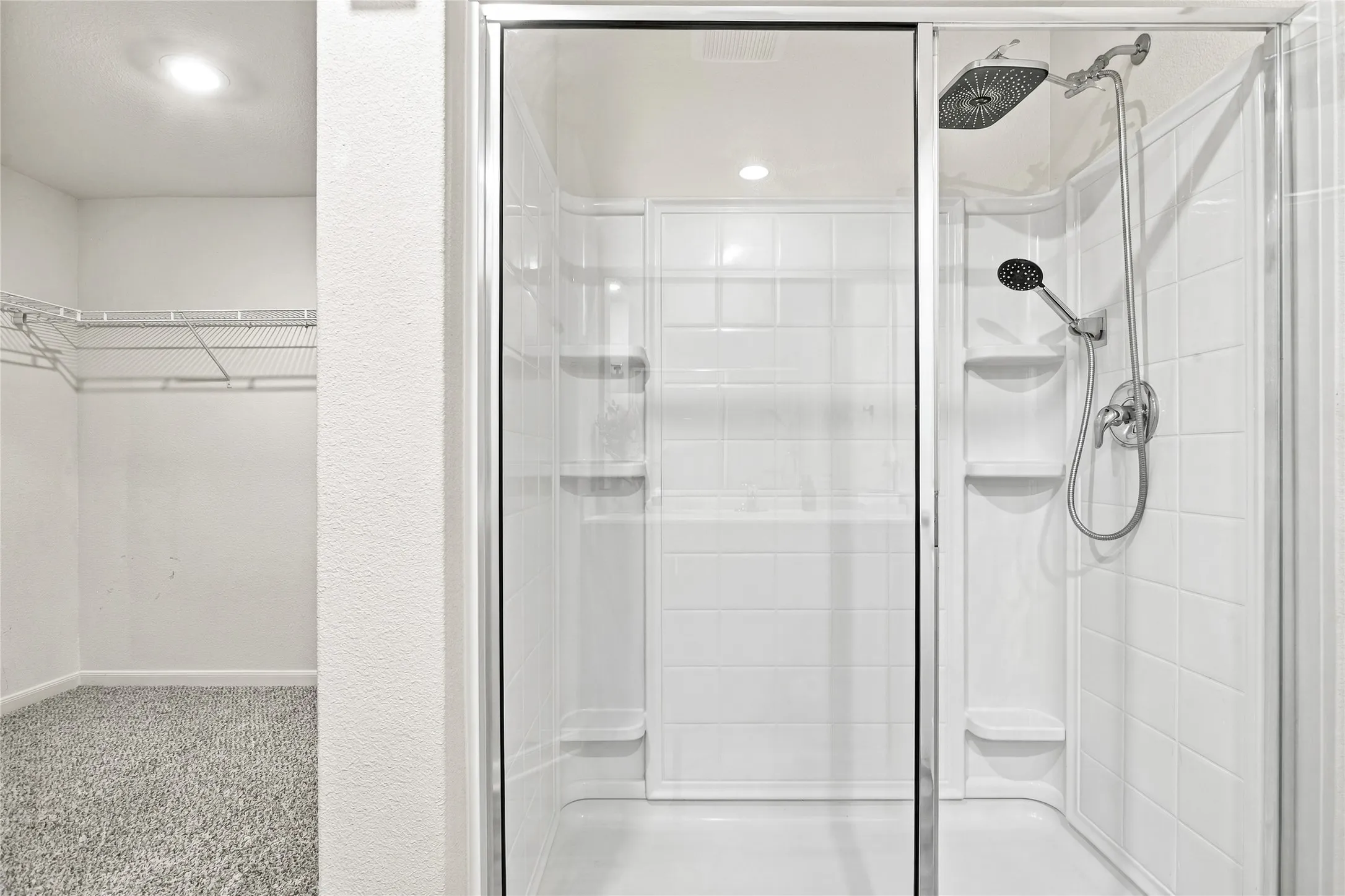 Primary Bathroom with Large Walk-In Closet and Over-Sized Shower