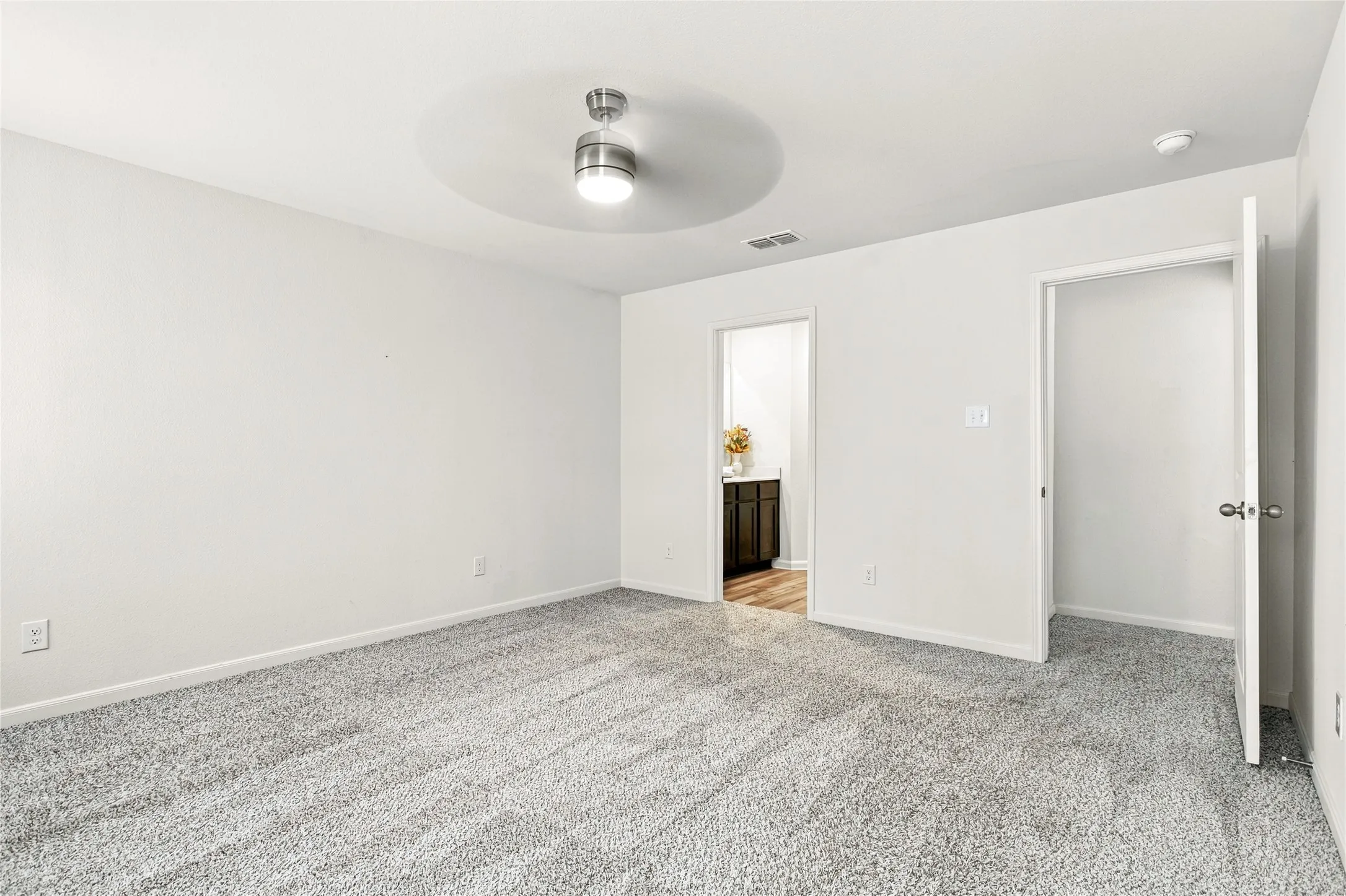 View of the Primary Bedroom with Ensuite Bathroom