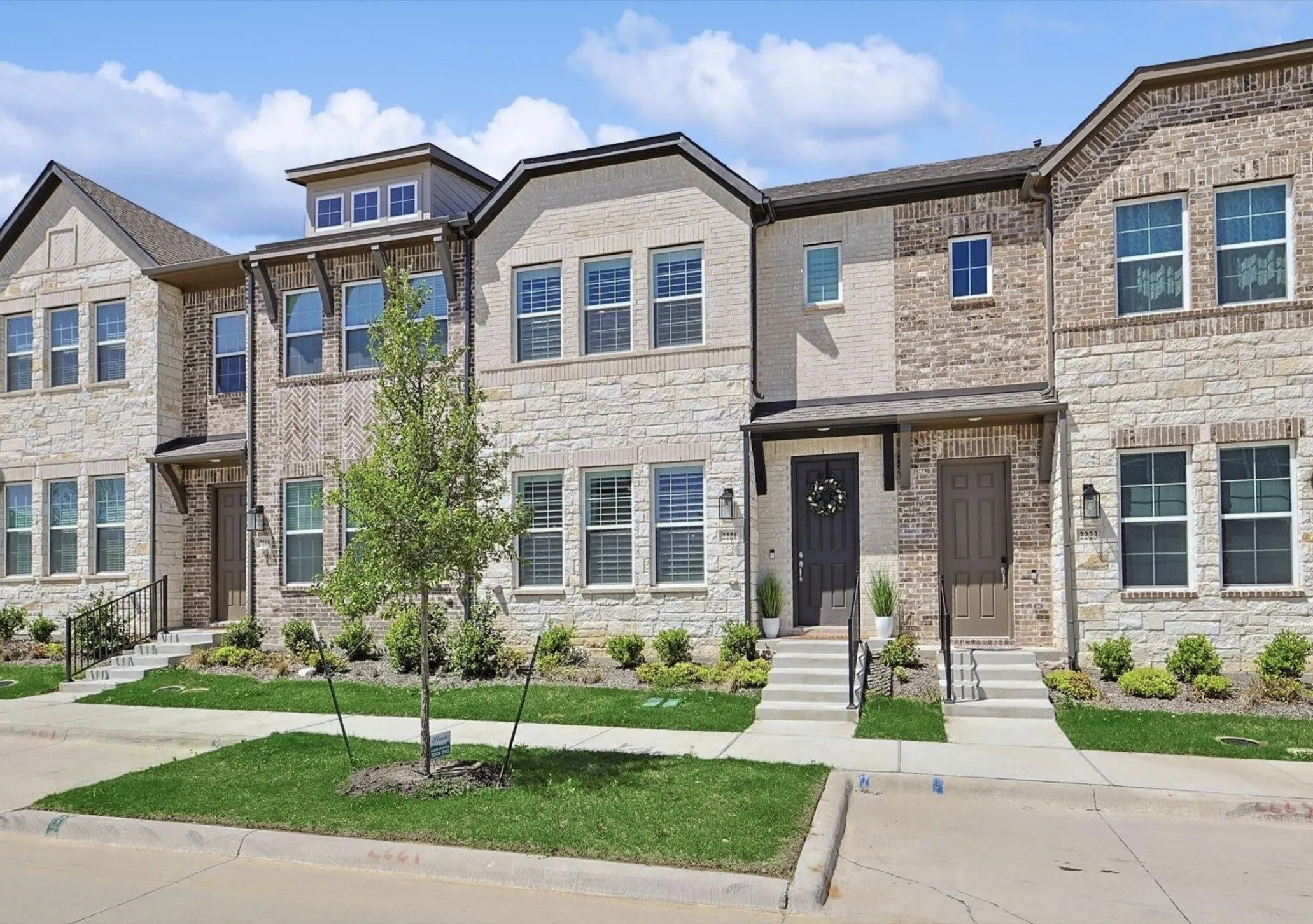 Stone and brick exterior with multiple windows