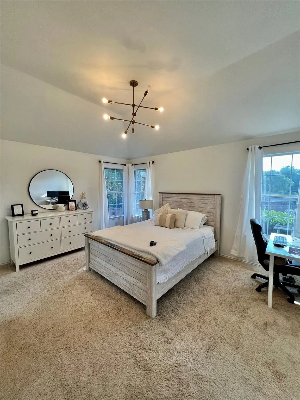 Tray ceiling with a modern sputnik chandelier