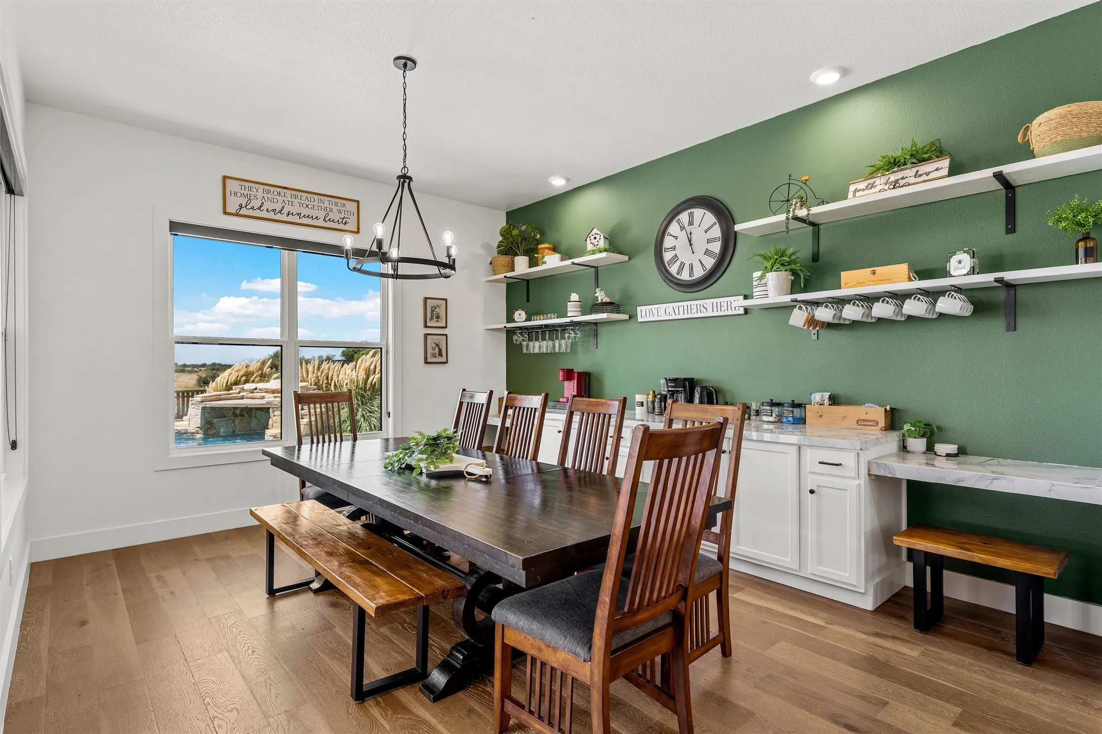 Wood-finish flooring throughout, complemented by a large window with white trim