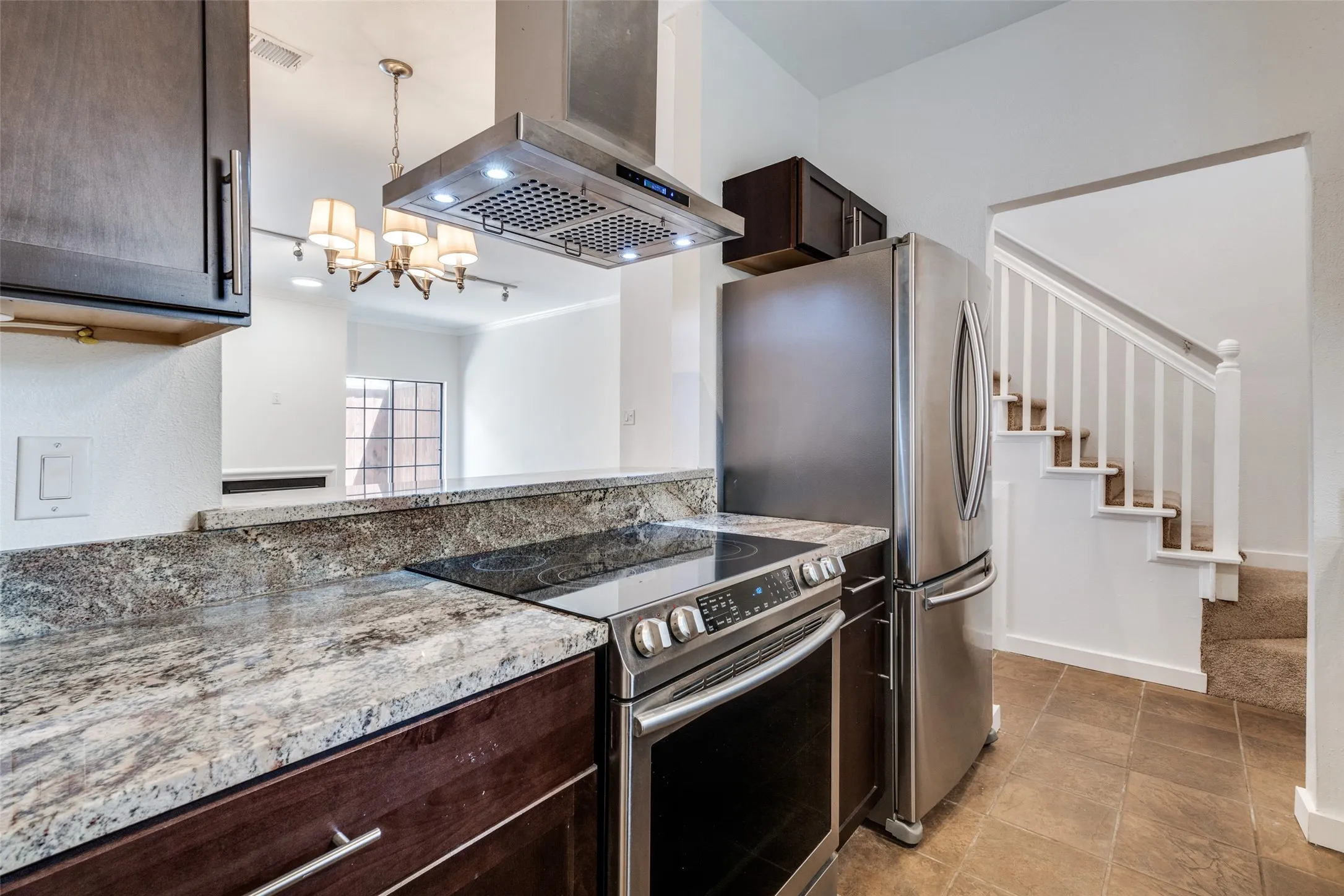 Open to living & dining. Updated & offers good storage.