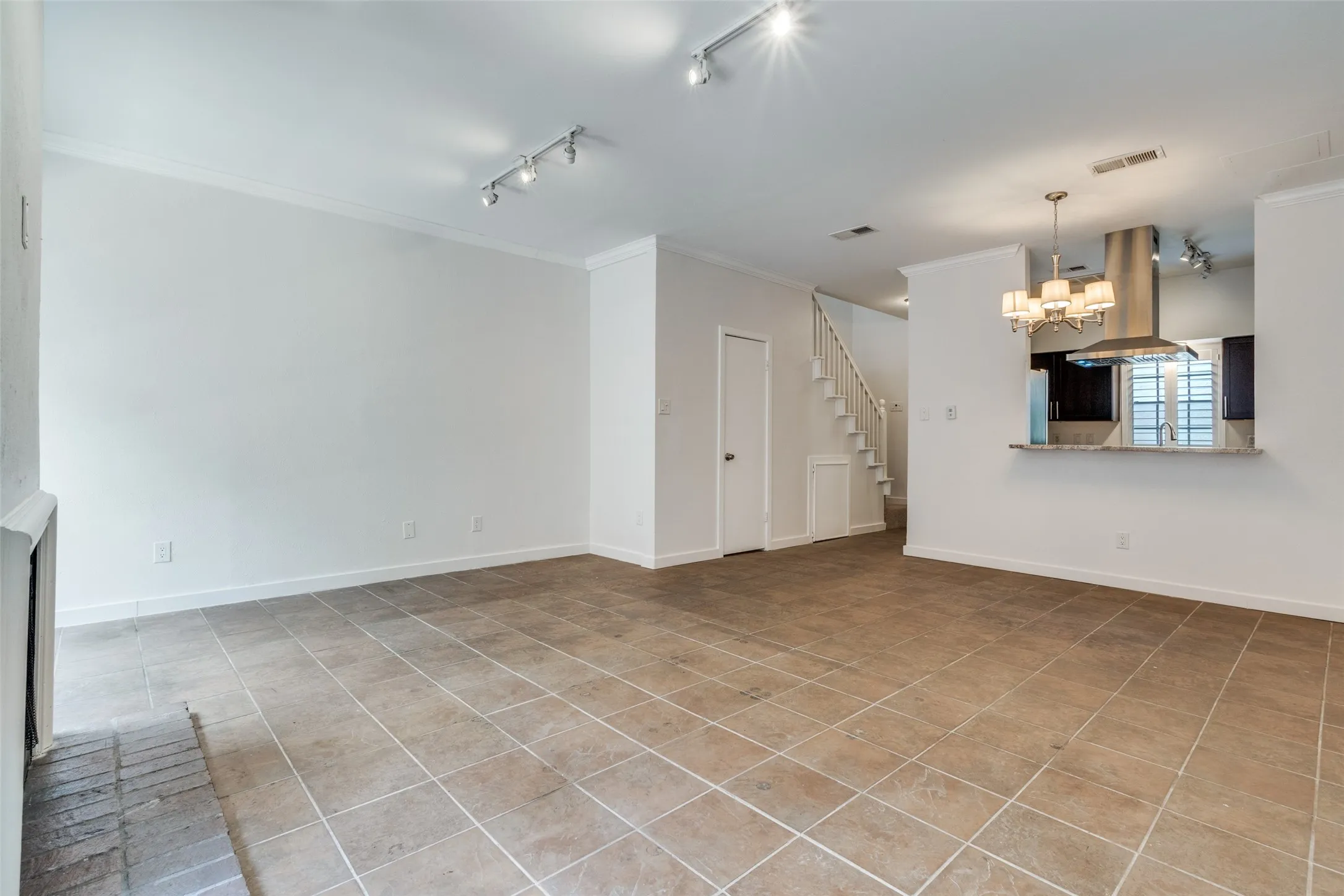 Dining area is connected to both kitchen and living area.