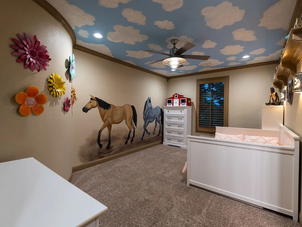 Upstairs Bedroom with hand painted mural and ensuite bathrooom.